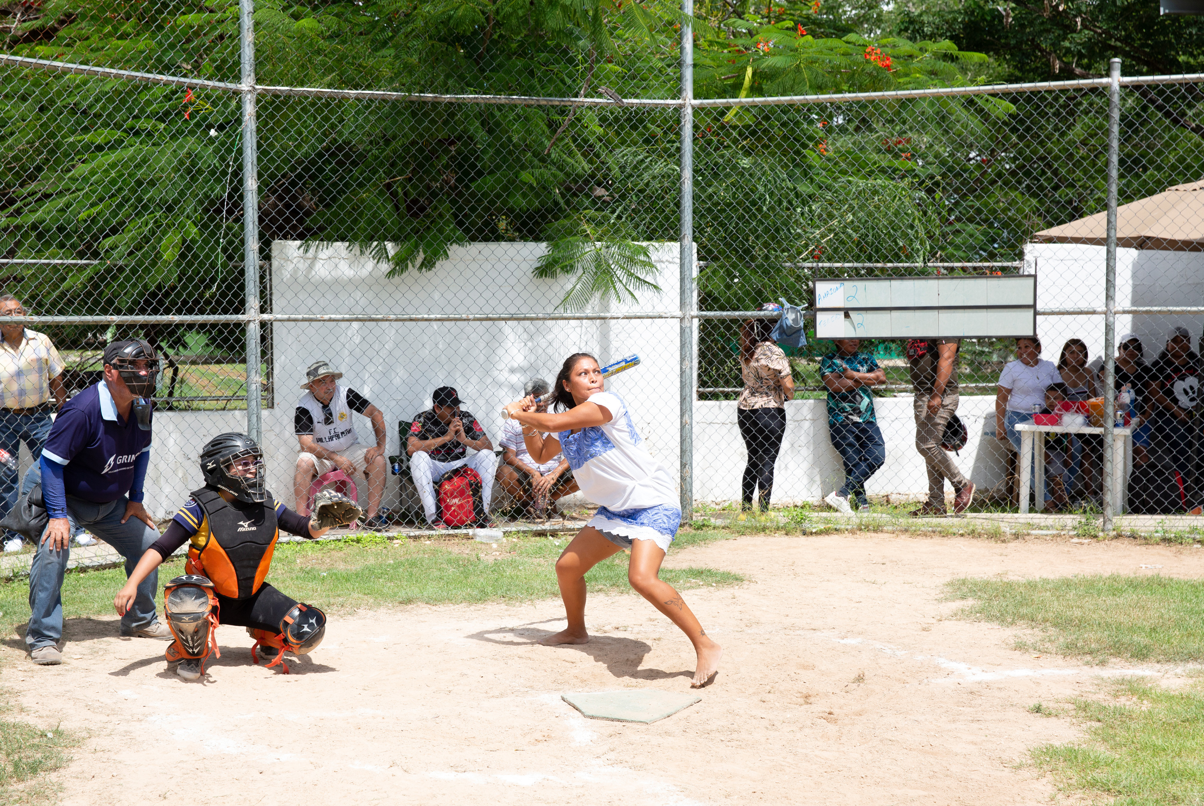 From glacier babies to a Barbie debate: 7 great global stories you might have missed 6 At bat, Mariela Beatriz Pacheco Pech, 31, a player on The Amazonas of Yaxunah, has her eye on the ball.