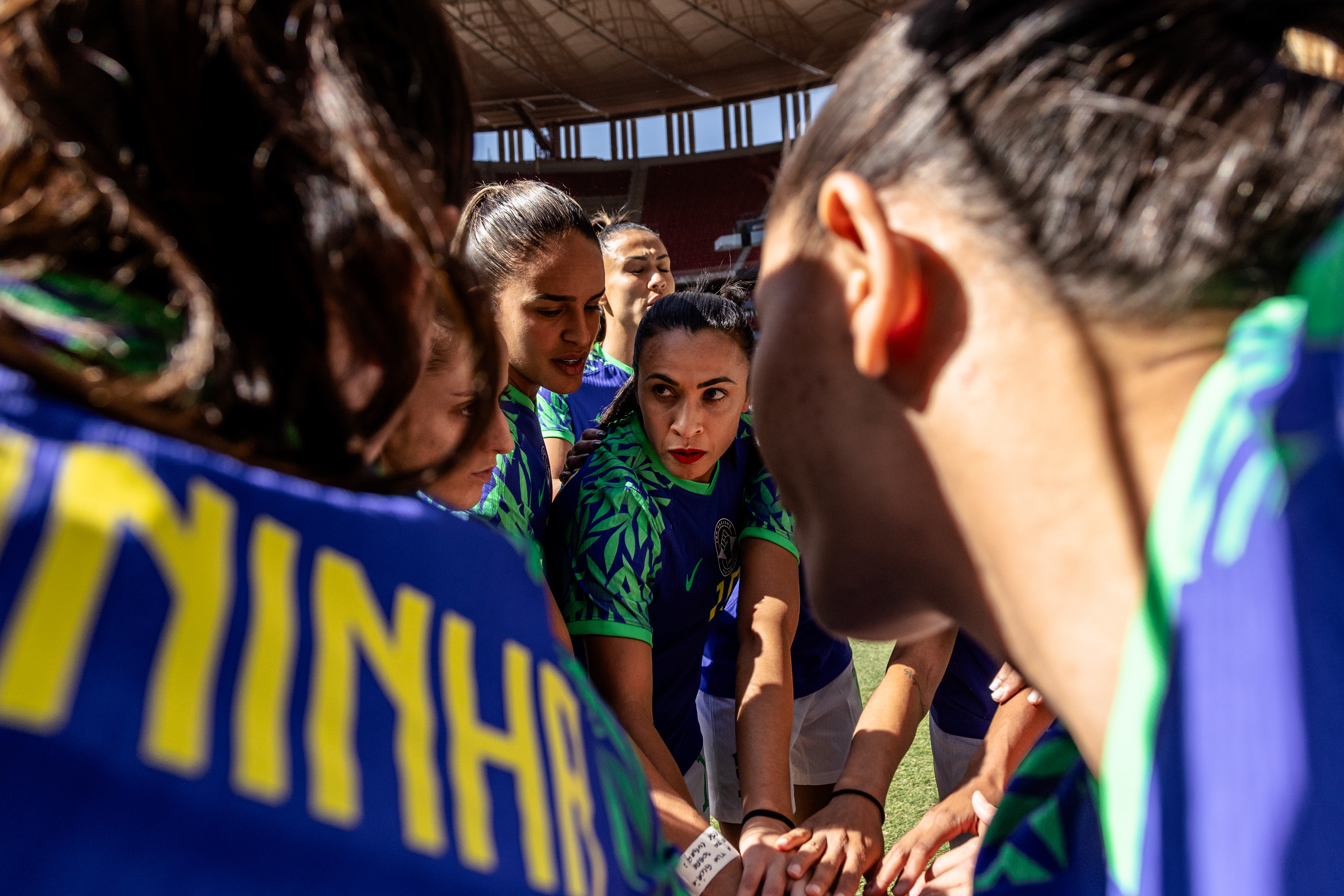 BRASÍLIA, BRAZIL — Marta huddles with her team before a friendly game against Chile ahead of the World Cup, on July 2nd. Click here for the full story.