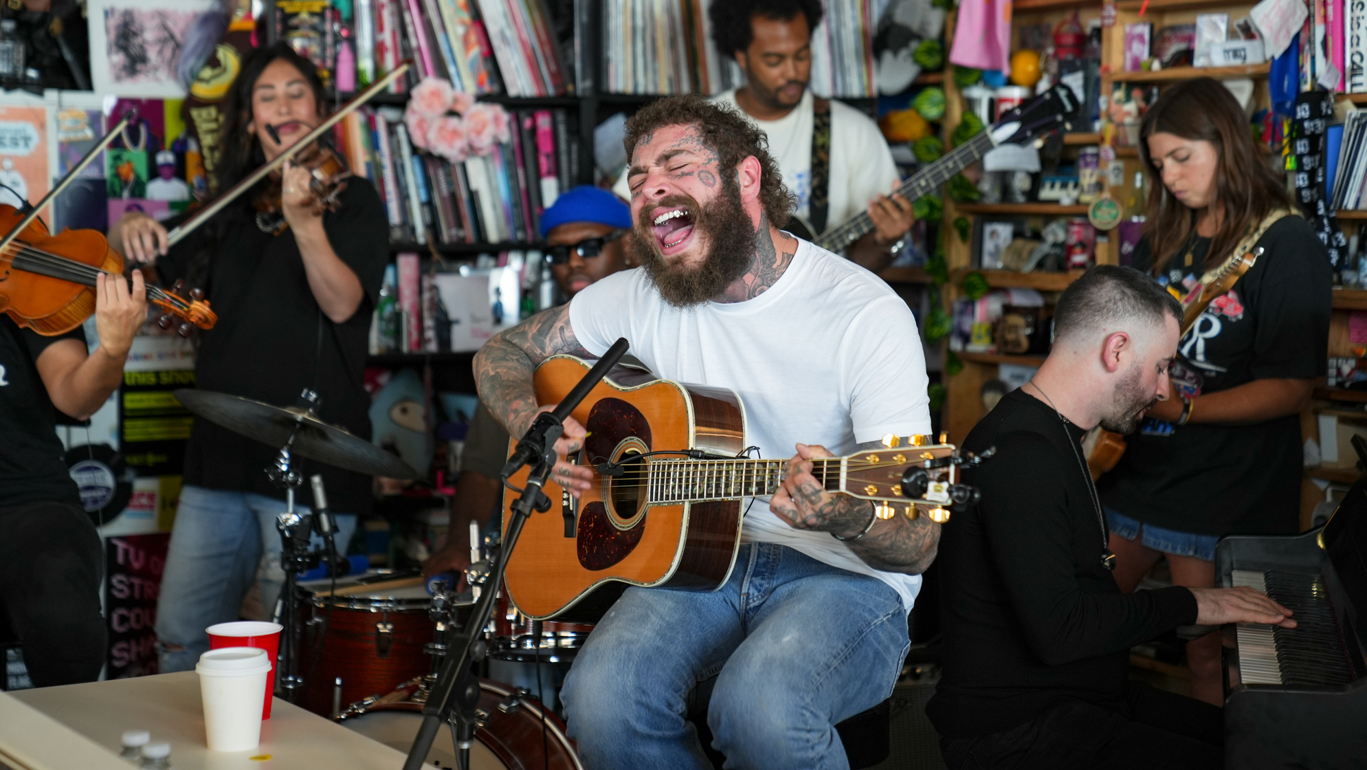 Want to know what it's like to photograph a Tiny Desk concert? 13 Watch the Post Malone Tiny Desk concert here.