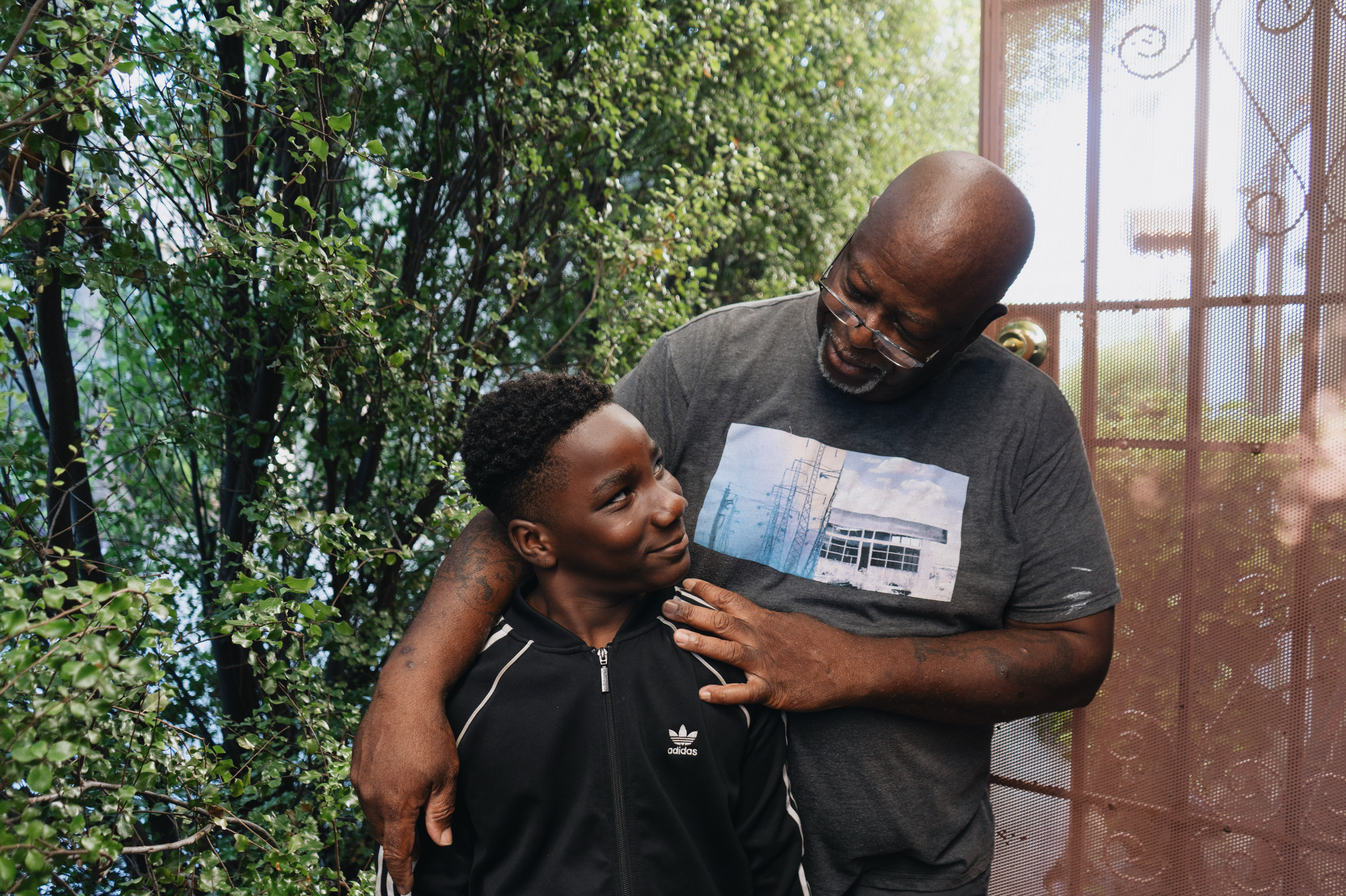 LOS ANGELES: Ziare Gearring (left) and his grandfather Ricky Brown pose for a portrait. The 65-year-old retired handyman had been struggling after taking in three grandsons after his ex-wife's death put him thousands of dollars behind on rent. See the story.