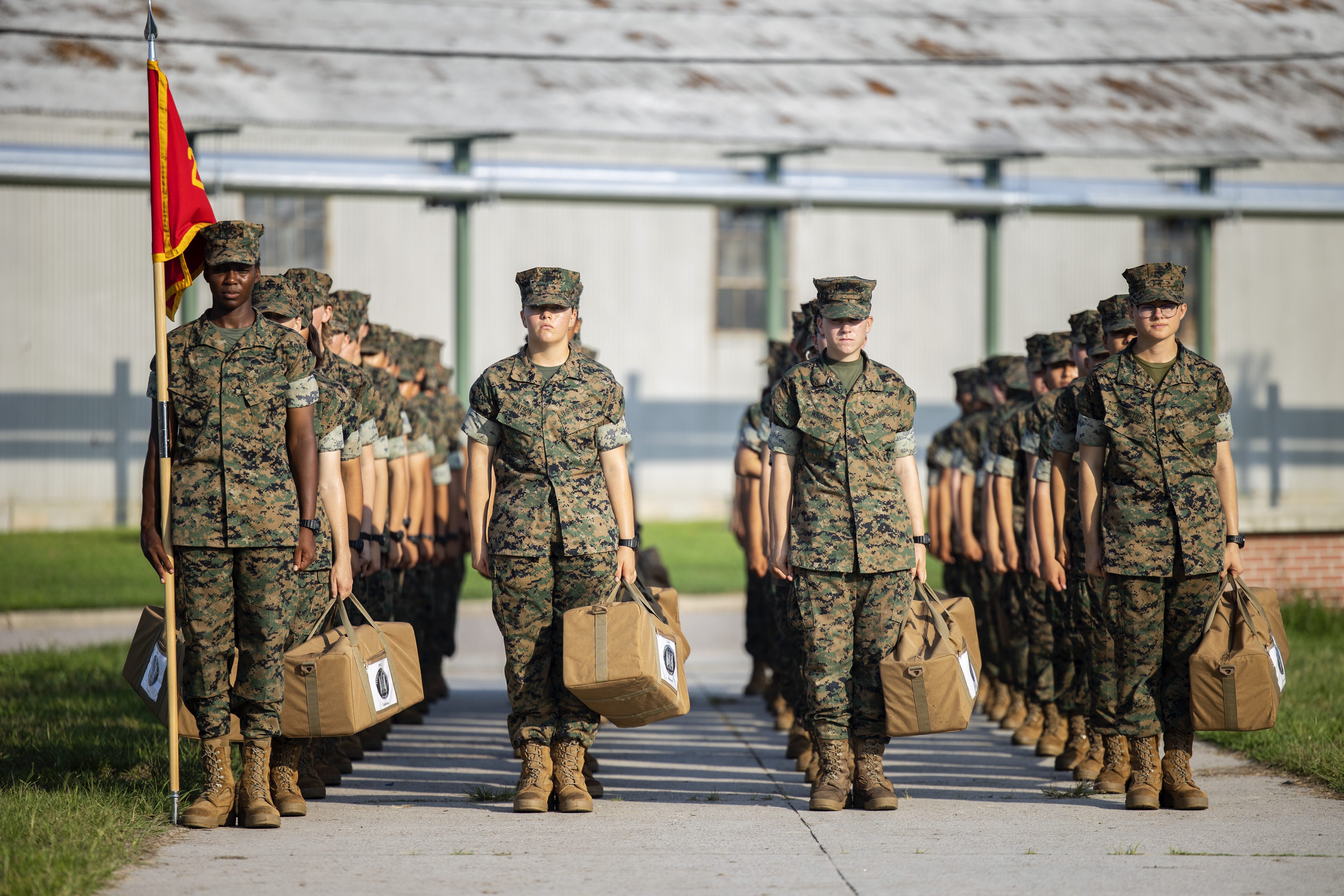 BEAUFORT COUNTY, S.C.: Marine recruits wait for their drill instructor as they cross the base at Marine Corps Recruit Depot, Parris Island on August 22, 2023. See the story.