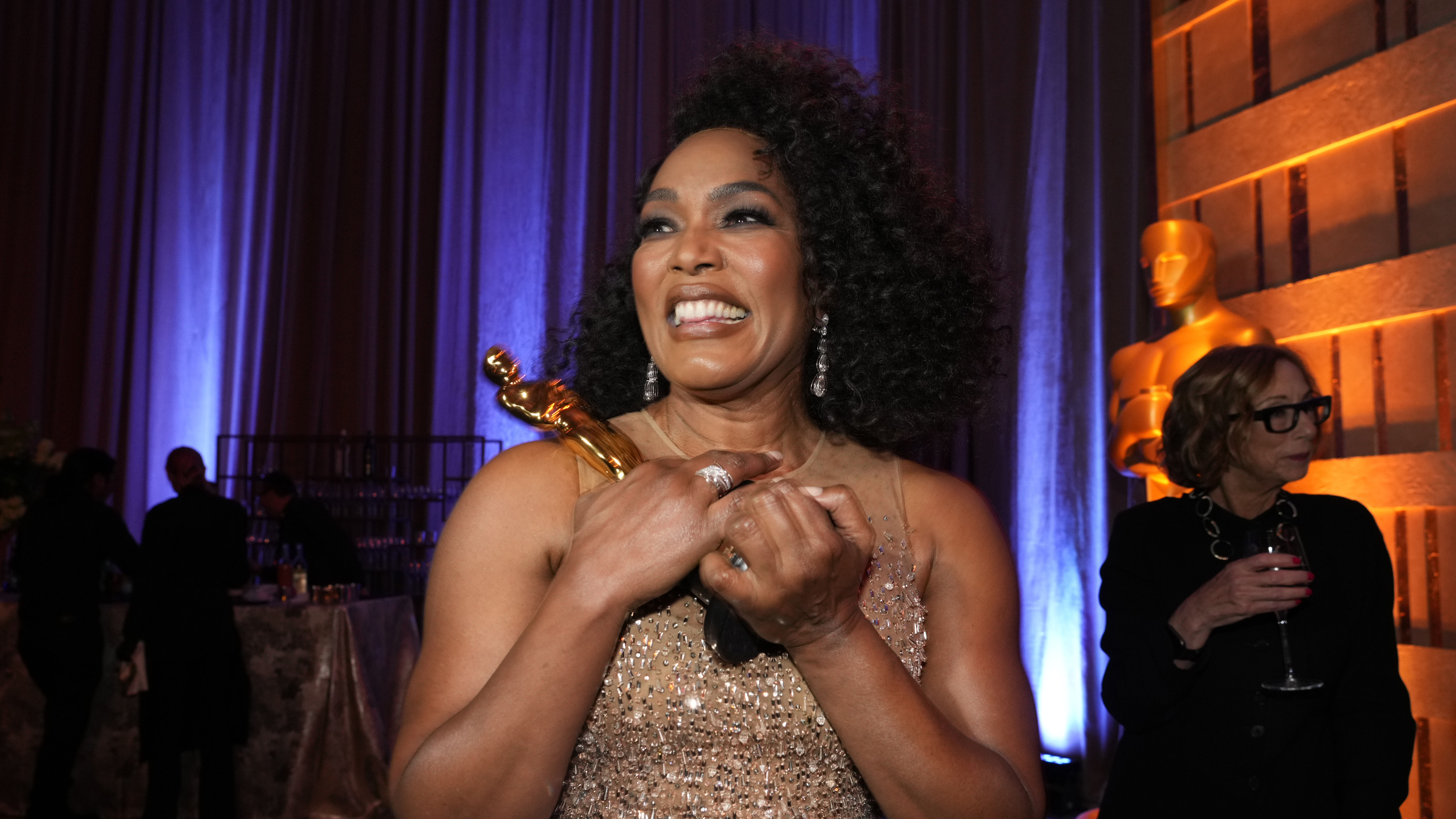 Angela Bassett poses with her honorary award during the Governors Awards on Tuesday, Jan. 9, 2024, at the Dolby Ballroom in Los Angeles.