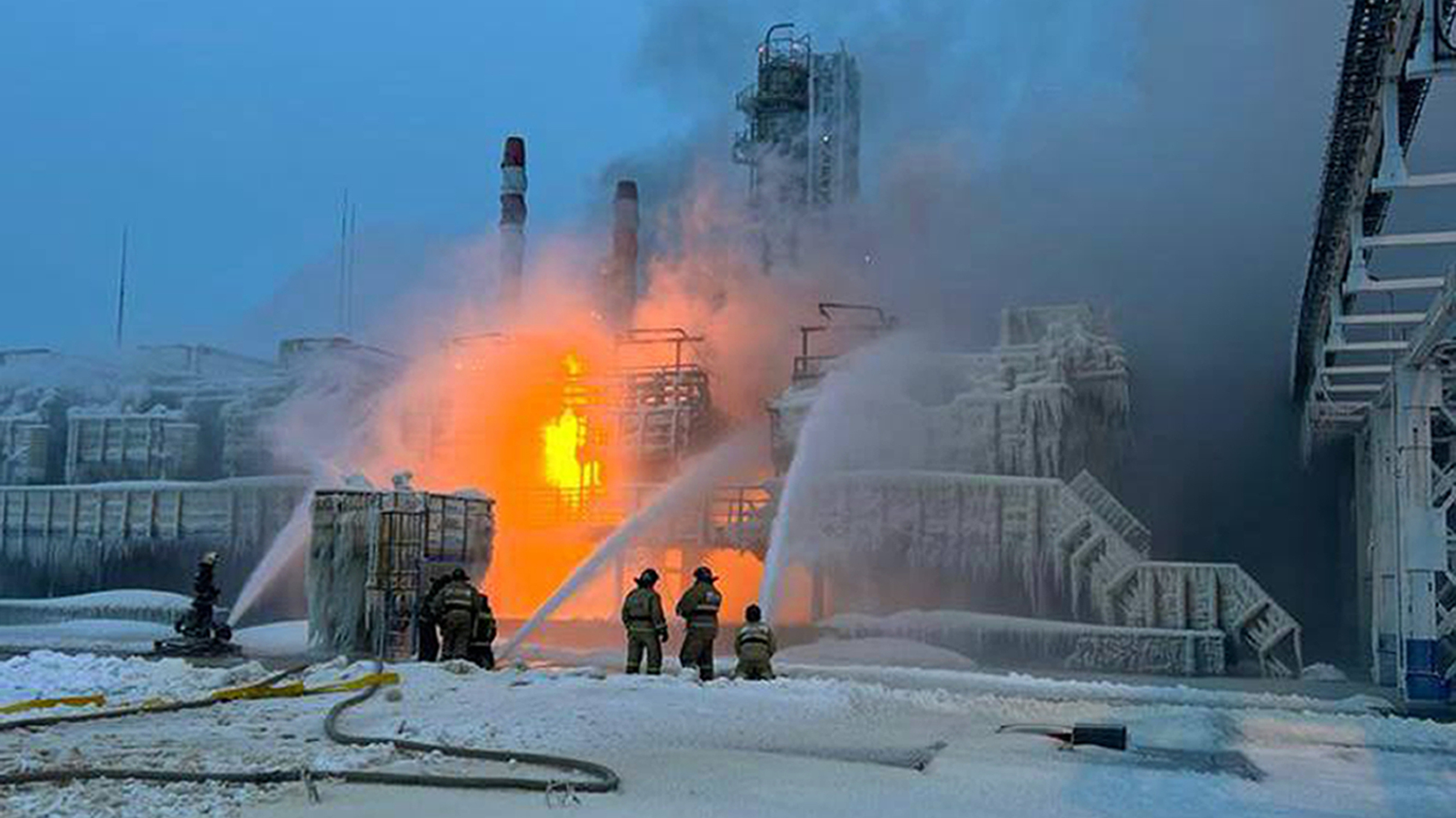 In this photo released by Telegram Channel of Leningrad Region Governor Alexander Drozdenko fire fighters extinguish the blaze at Russia