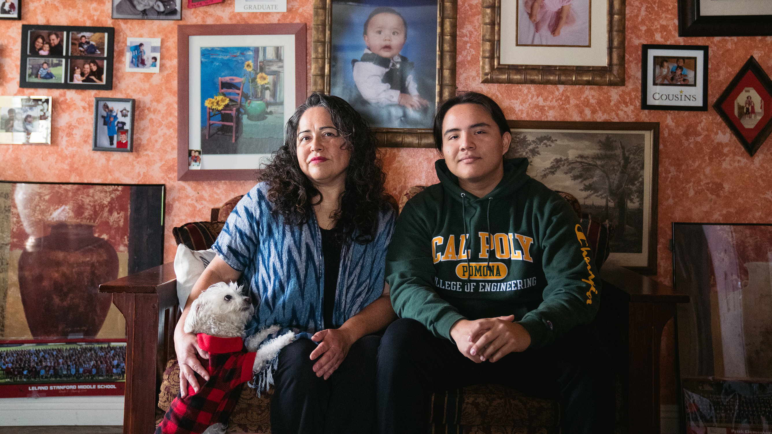 Myrna Aguilar and her son, David Thornton, pose for a portrait at their home in Los Angeles. Thornton applied for a pell grant last year, but did not qualify this academic year even though their income hasn