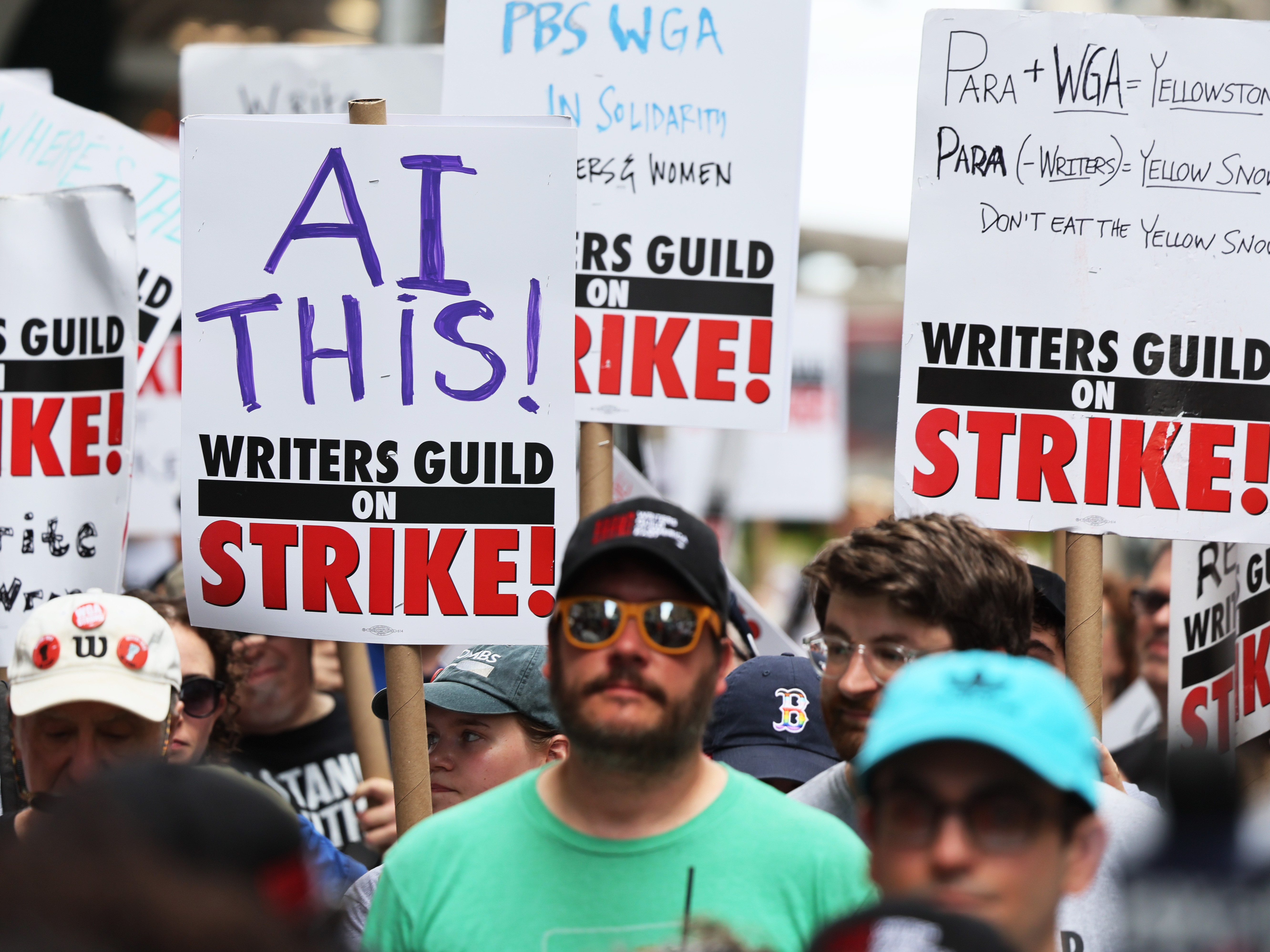 Members of the Writers Guild of America East picket at the Warner Bros. Discovery NYC office on July 13, 2023 in New York City. (Getty Images)