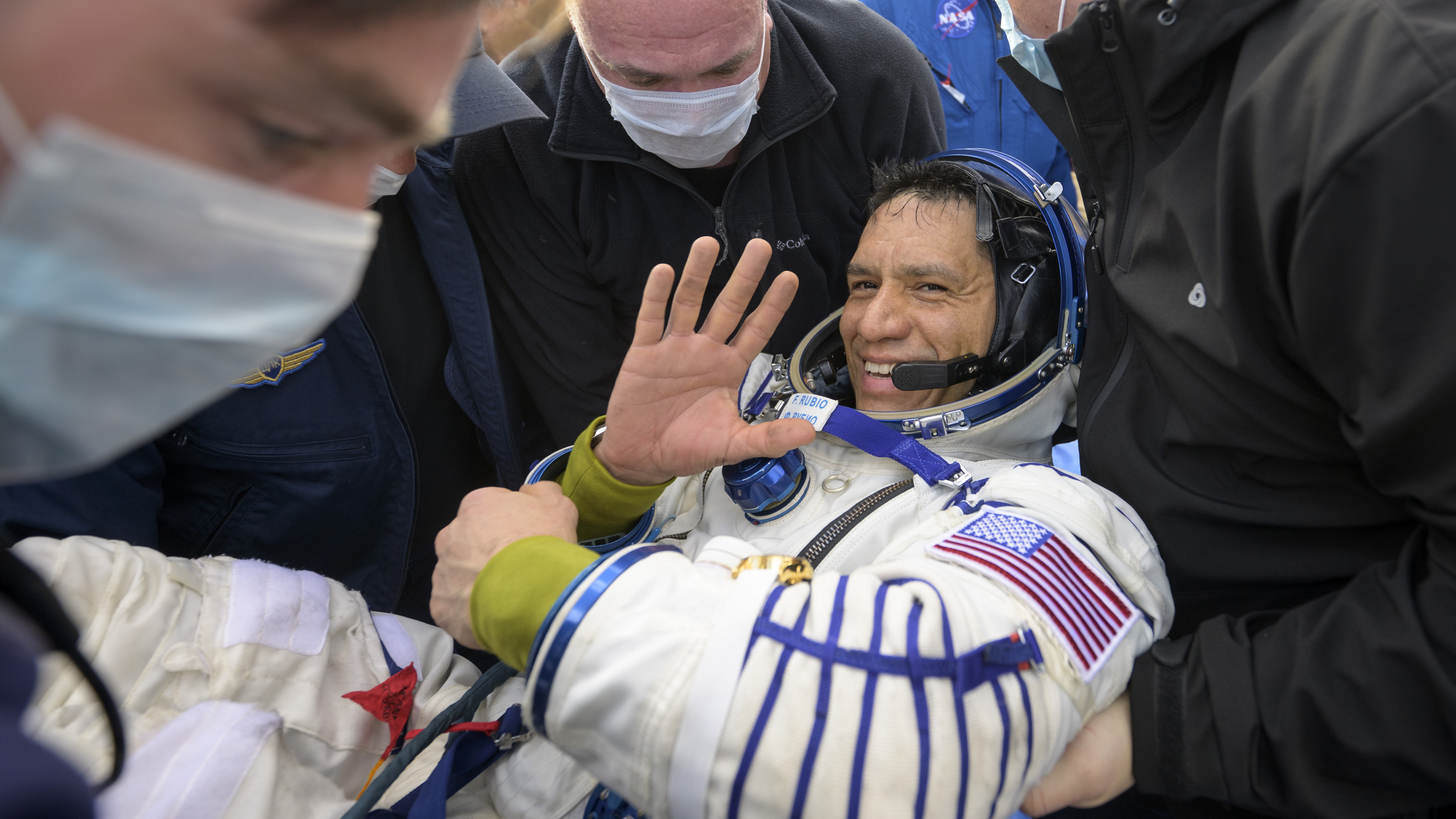 Frank Rubio is helped out of the Soyuz MS-23 spacecraft just minutes after he and cosmonauts Sergey Prokopyev and Dmitri Petelin landed in a remote area of Kazakhstan on Sept. 27, 2023.