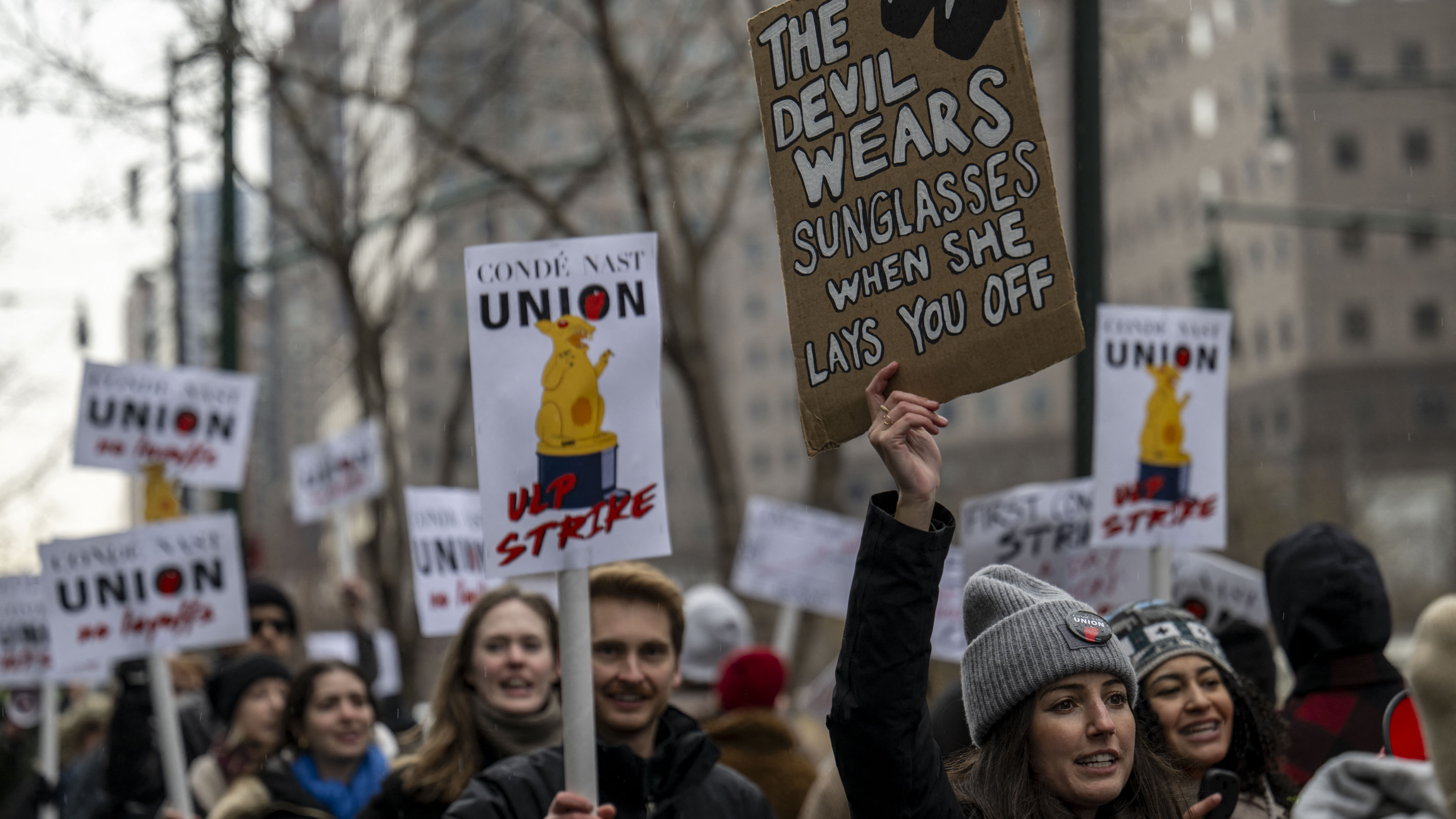 Unionized staff picket outside the Condé Nast offices in New York on Jan. 23. The company is merging the popular digital music publication Pitchfork with the men