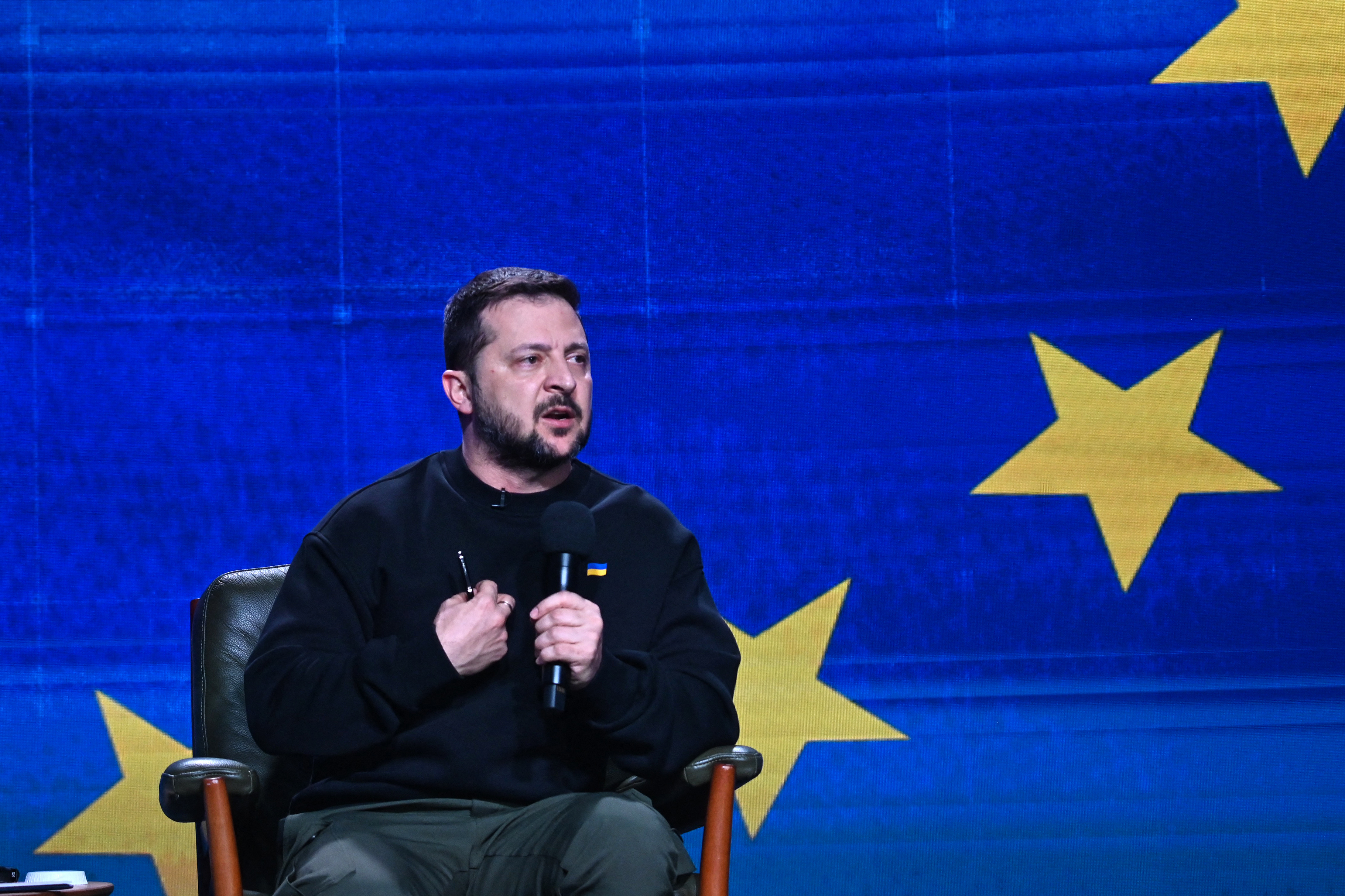 As Ukraine seeks to replenish its depleted army, a divide grows among its civilians 1 Ukrainian President Volodymyr Zelenskyy delivers an end-of-year news conference in Kyiv on Dec. 19.