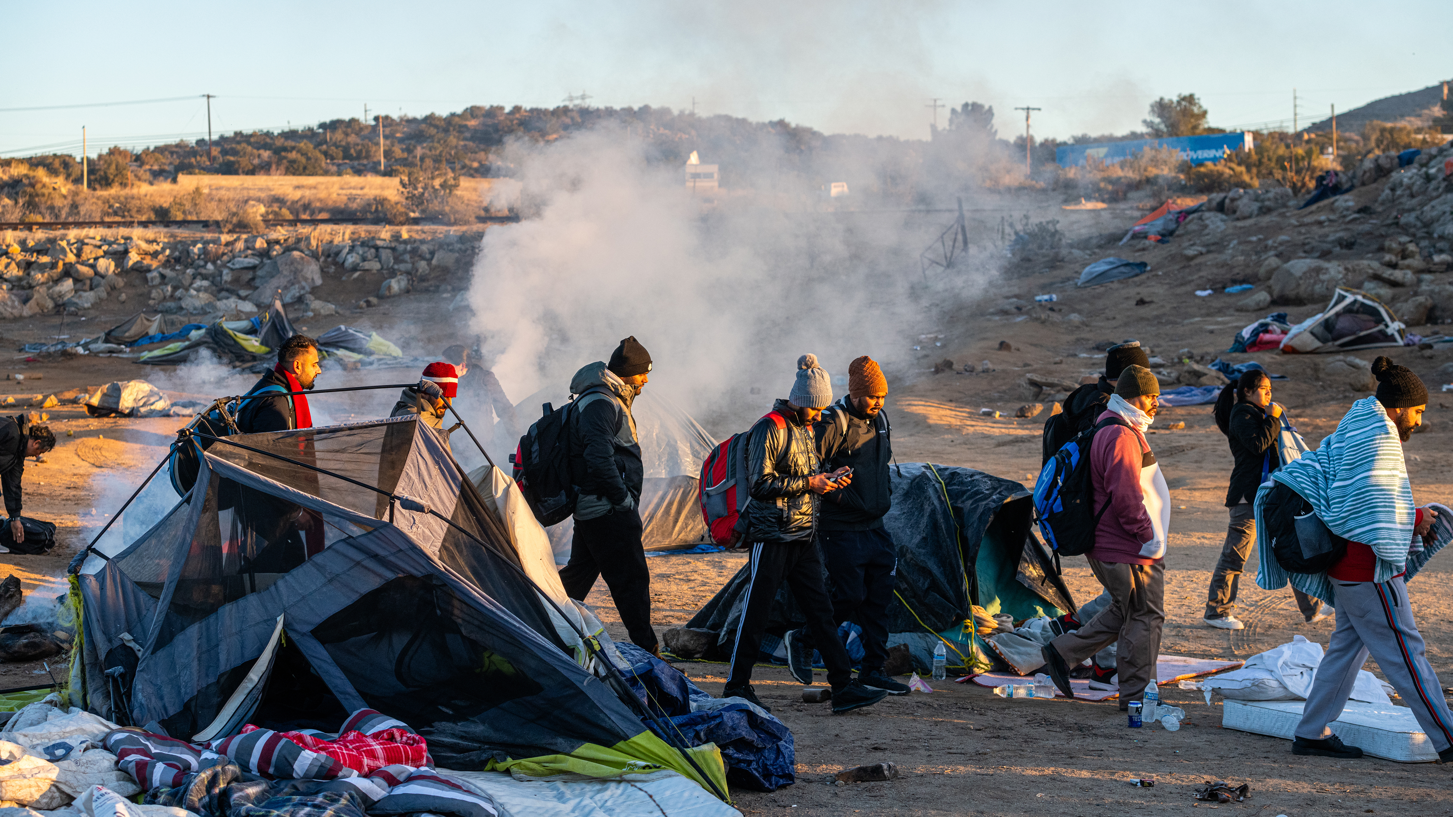 U.S. Customs and Border Protection has corralled would-be asylum seekers into what locals are calling open-air detention camps (OADs) in and around Jacumba, Calif. Above, migrants appear inside one of the camps on Jan. 12.