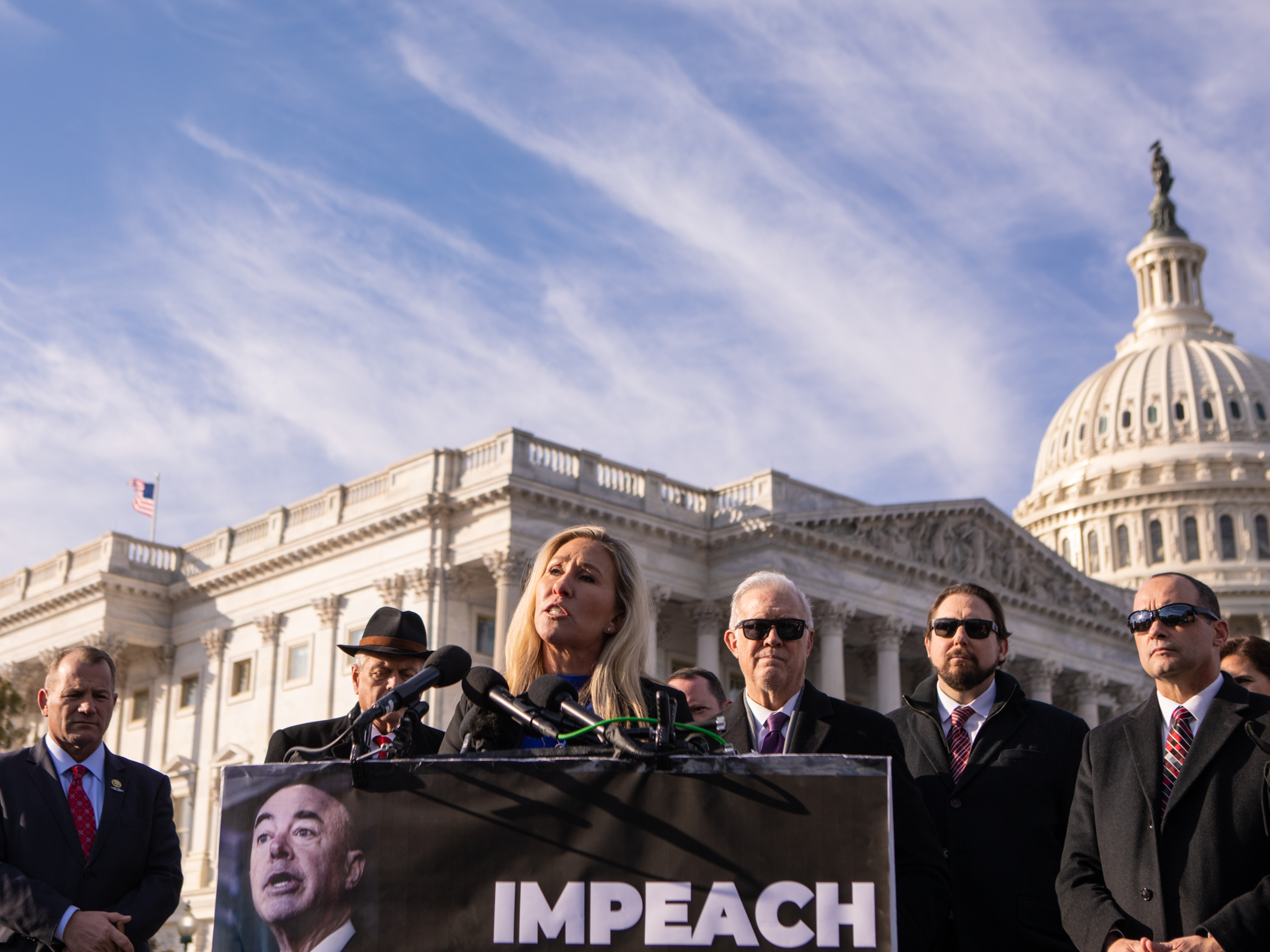 Rep. Marjorie Taylor Greene, R-Ga., speaks during a news conference about impeaching Department of Homeland Security Secretary Alejandro Mayorkas last winter. (Bloomberg via Getty Images)