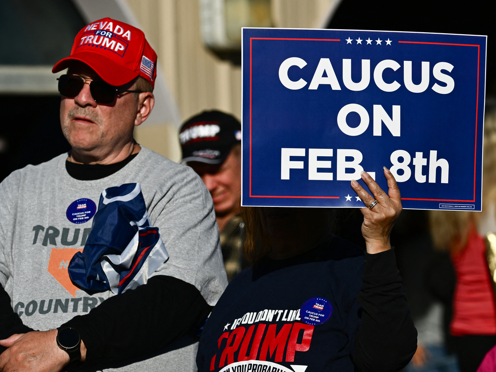 Supporters of former President Donald Trump arrive to hear him speak at a commit to caucus rally in Las Vegas in January. The Nevada Republican Party is holding a caucus to determine who wins the state's GOP delegates — a contest that's two days after the state-run primary. (AFP via Getty Images)