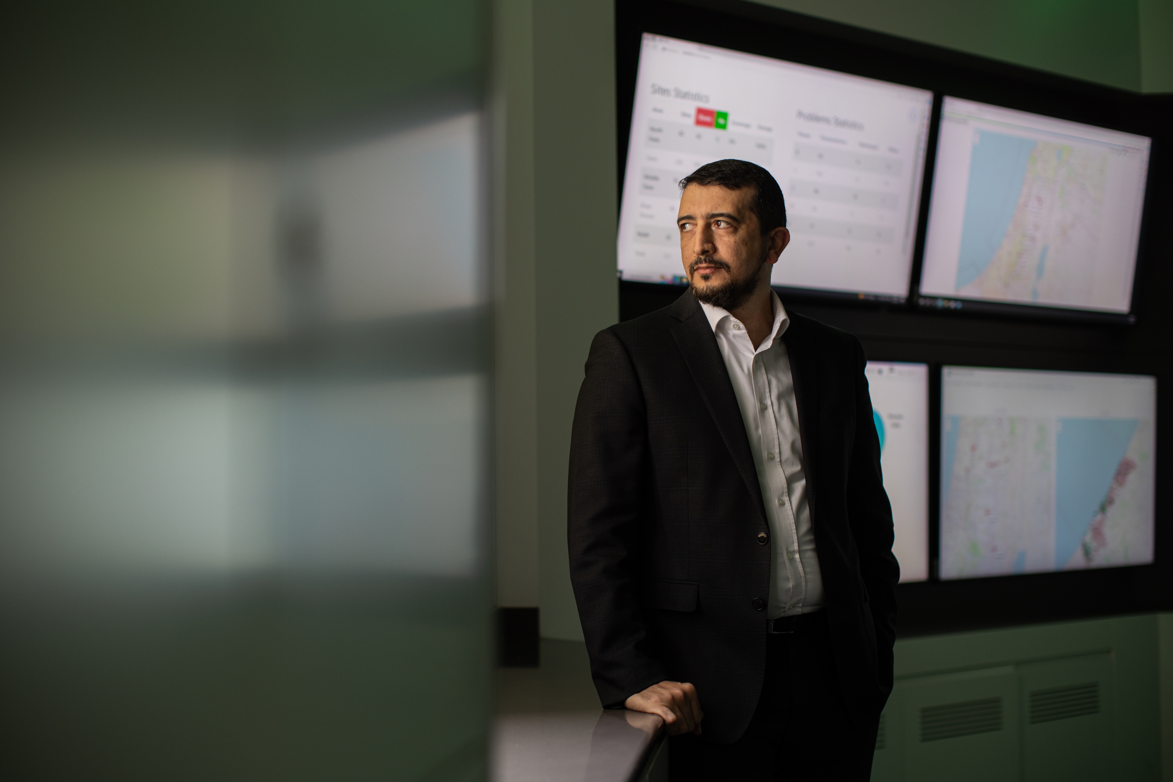 Hamzah Naseef, head of core operations for the Palestinian Telecommunications Co., stands in the operations center of the Paltel headquarters in Ramallah, West Bank. Paltel has more than 500 cell towers in Gaza, and 80% of them have been destroyed during the war, Naseef says.