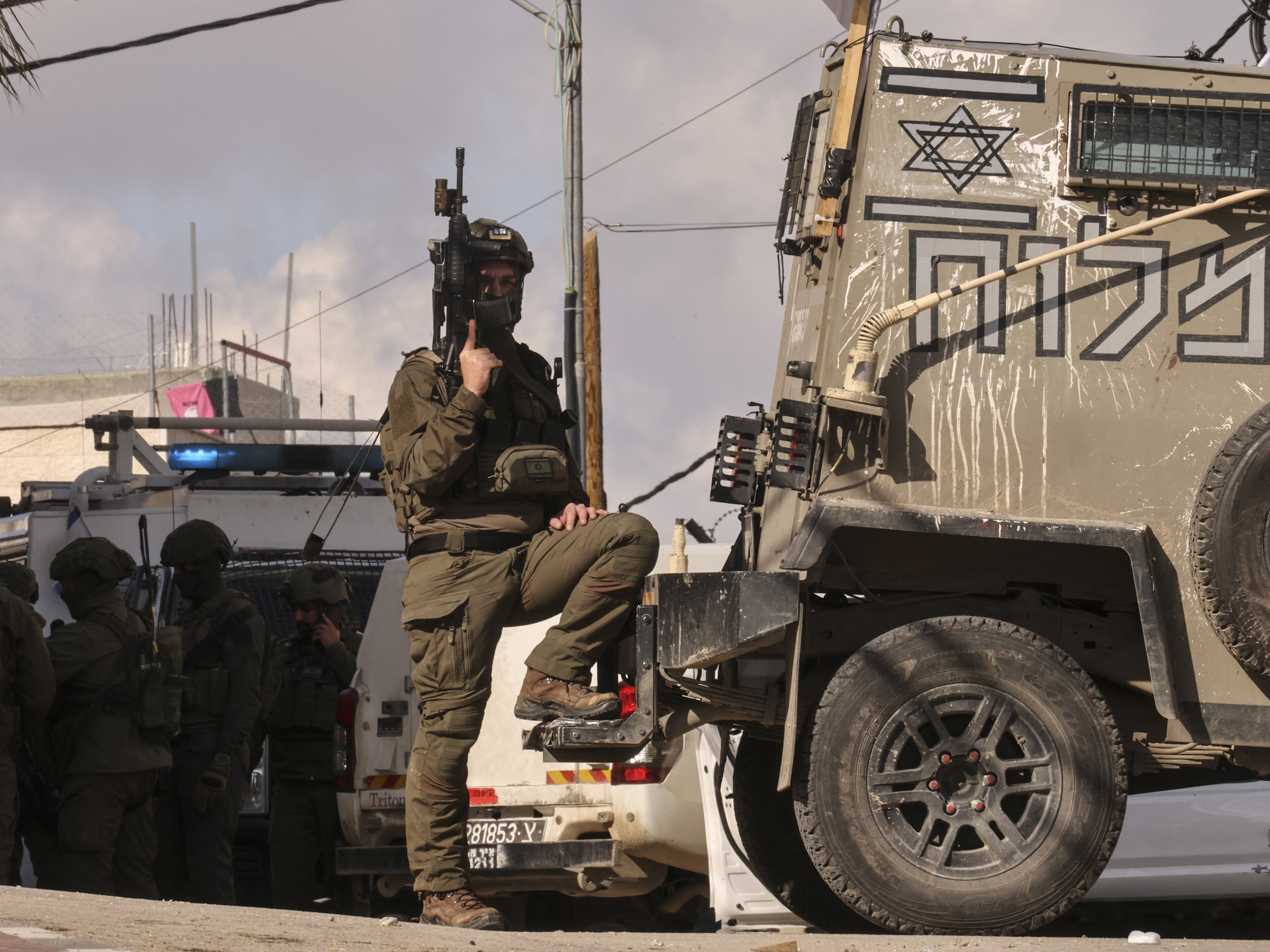 Israeli settlers are guarding the West Bank. Palestinians say it's worsening violence