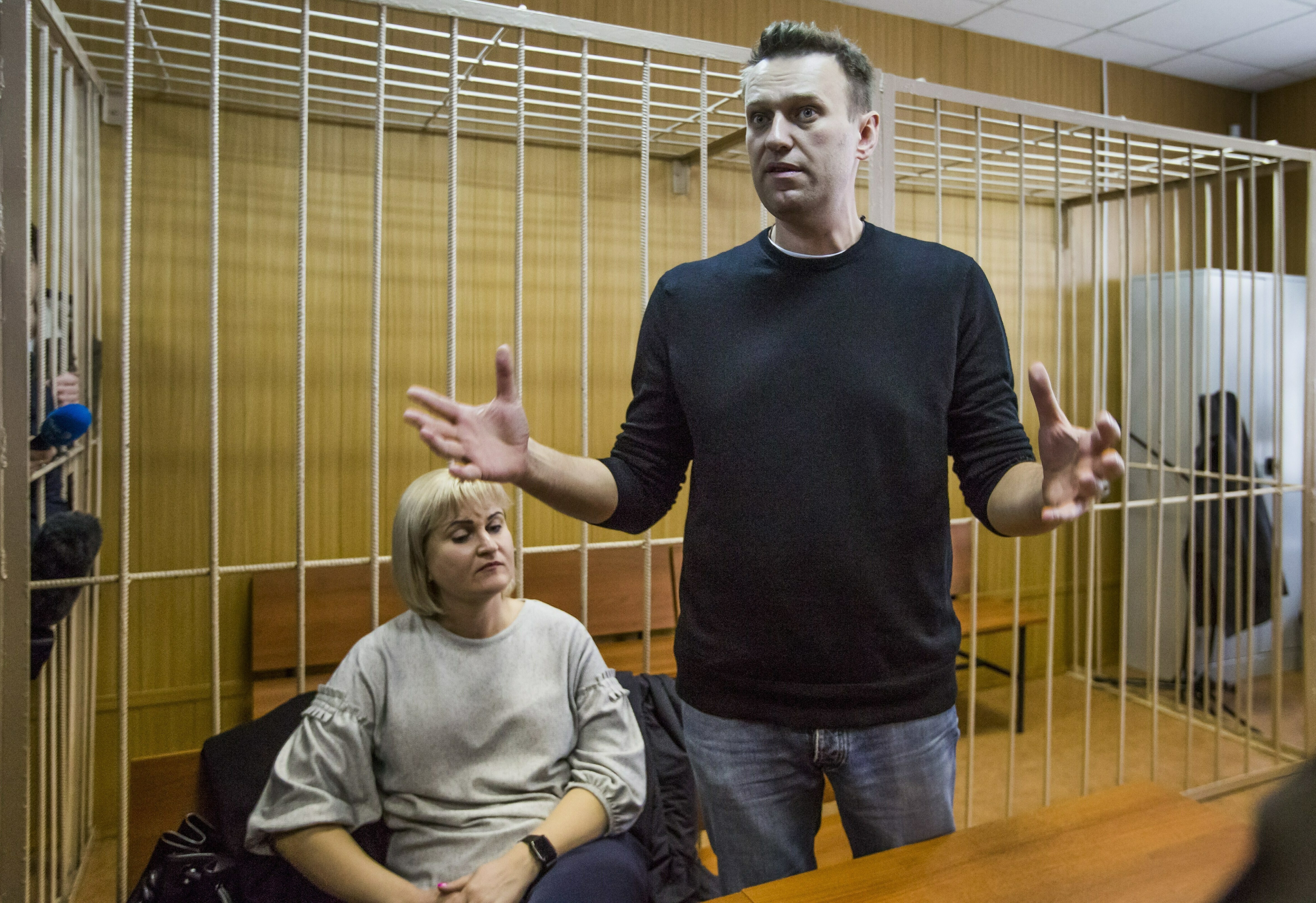 Photos: See Russian anti-corruption leader Alexei Navalny's life in pictures 9 March 27, 2017: Russian opposition leader Alexei Navalny gestures while speaking, as his lawyer Olga Mikhailova listens, in court in Moscow, Russia. Navalny, who organized a wave of nationwide protests against government corruption that rattled authorities, was fined 20,000 rubles ($340) on Monday by a Moscow court.