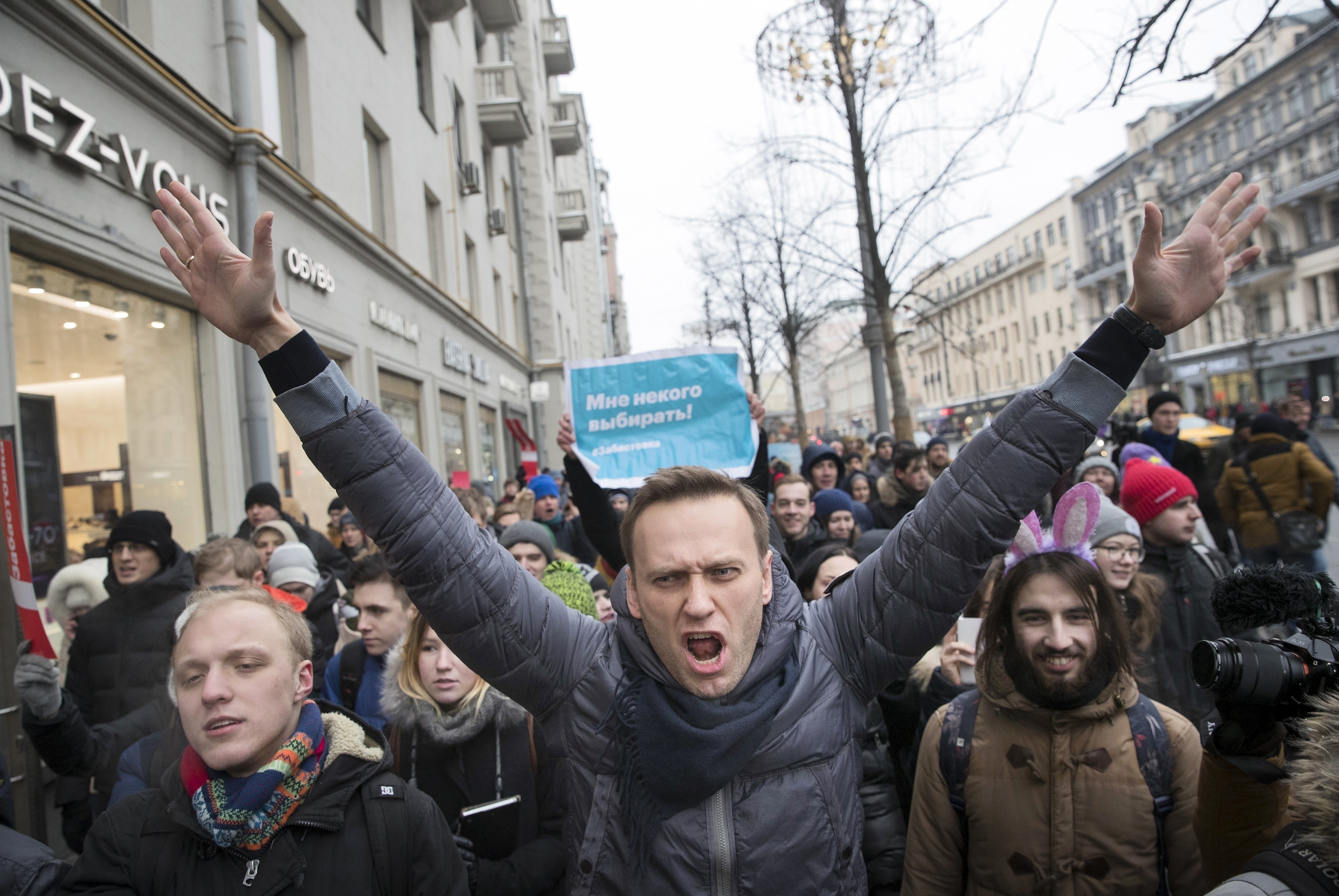 Photos: See Russian anti-corruption leader Alexei Navalny's life in pictures 11 Jan. 28, 2018: Russian opposition leader Alexei Navalny, center, attends a rally in Moscow, Russia.