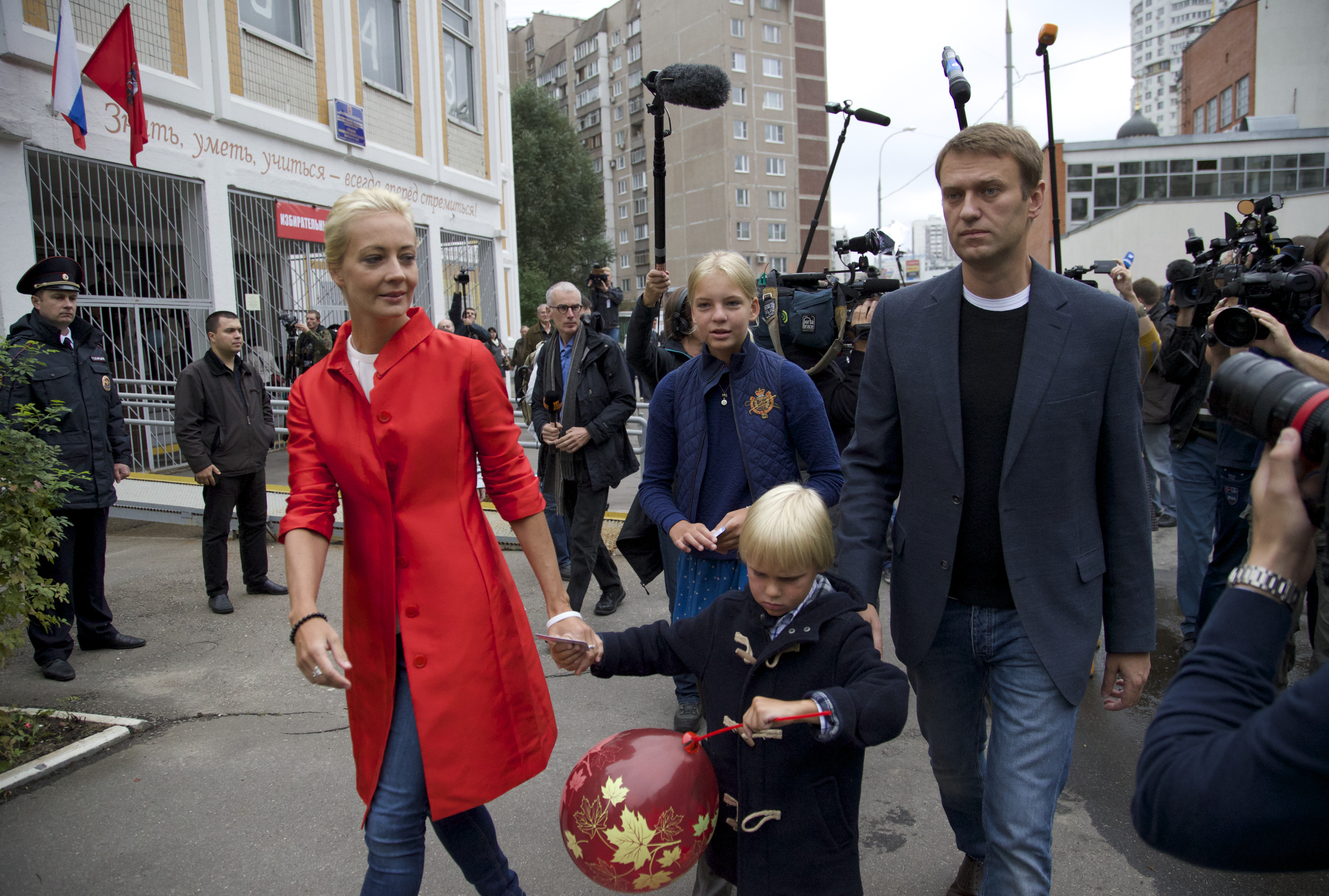 Photos: See Russian anti-corruption leader Alexei Navalny's life in pictures 5 Sept. 8, 2013: Russian opposition leader Alexei Navalny, right, with his wife Yulia, daughter Daria, and son Zakhar leave a polling station in Moscow's mayoral election. Moscow is holding its first mayoral election in a decade.