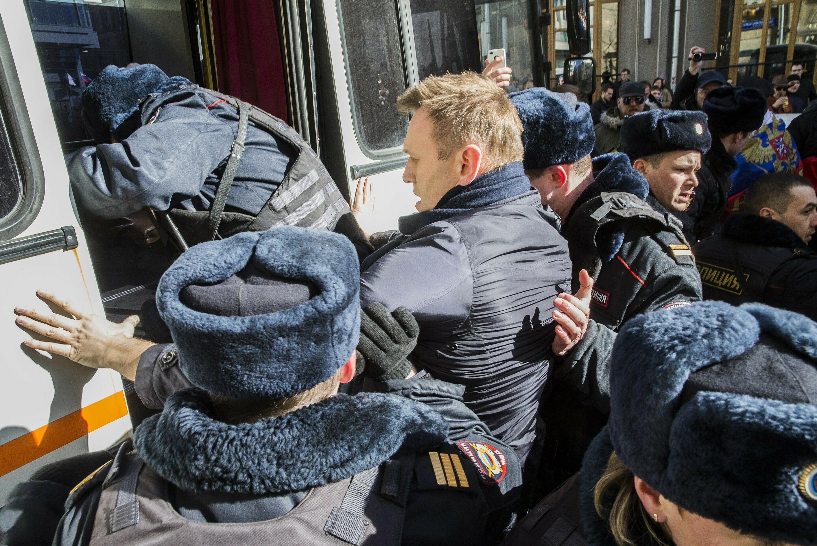 Photos: See Russian anti-corruption leader Alexei Navalny's life in pictures 8 March 26, 2017: Police officers detain anti-corruption campaigner and opposition figure Alexei Navalny during an opposition rally in Moscow.