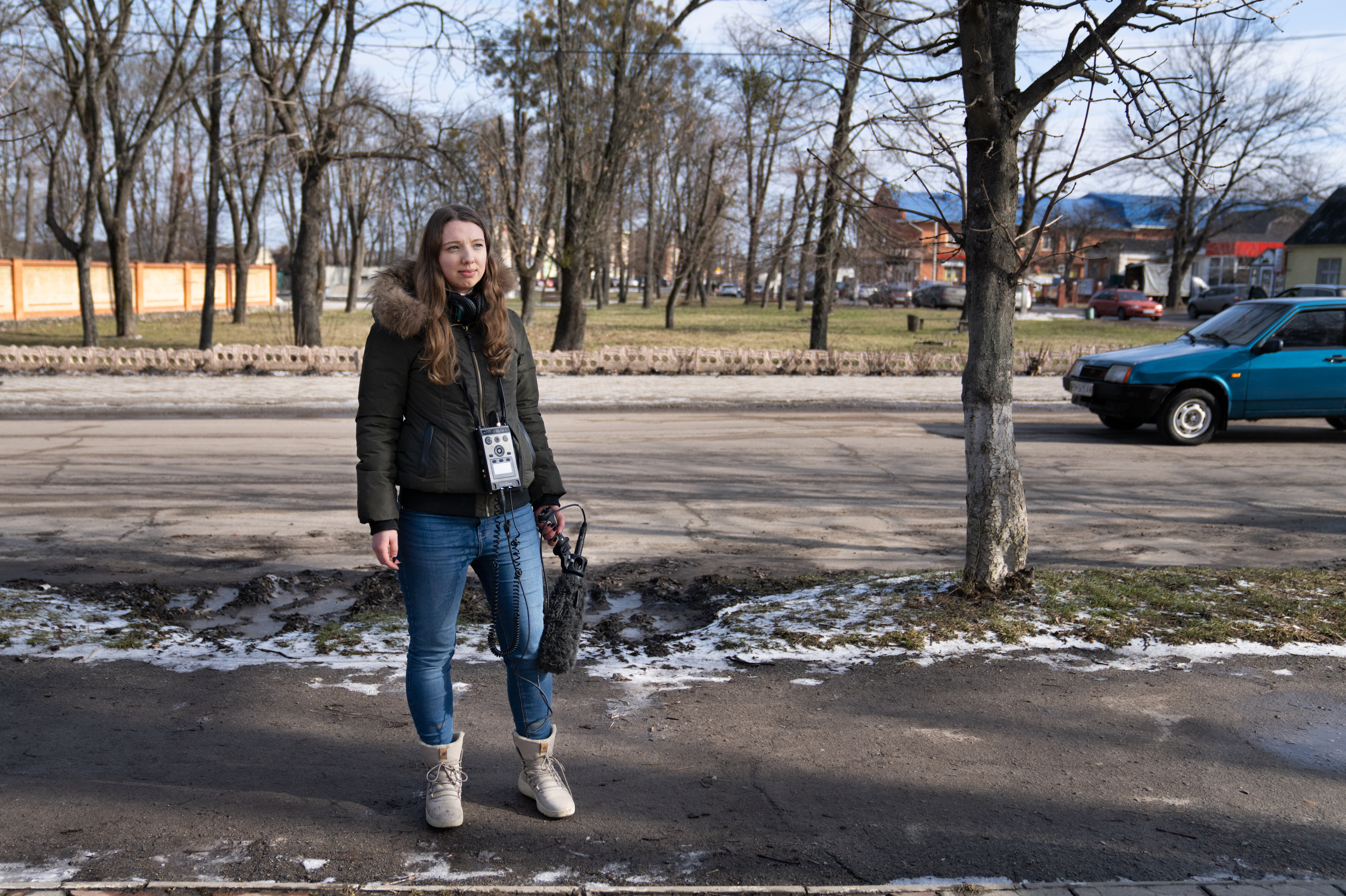 Lytvynova stands in Krasnopillya, a town in Ukraine's Sumy region near the Russian border, while reporting in February.