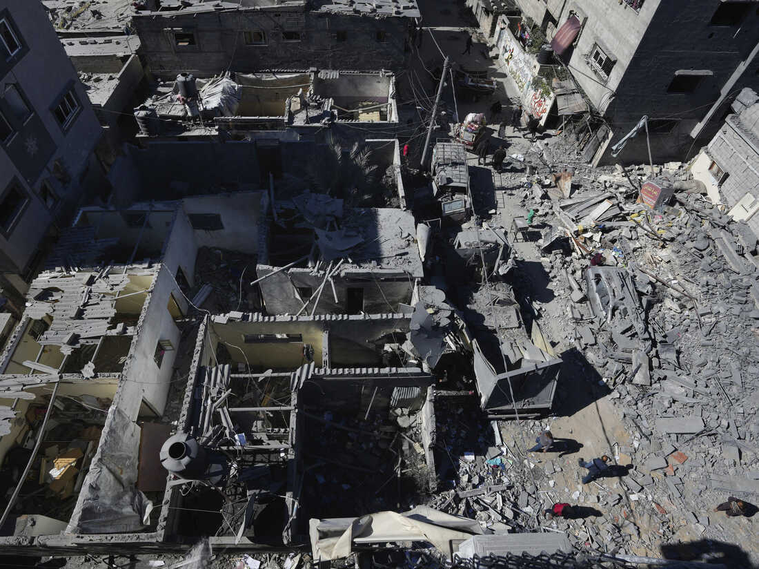 Scores killed in Gaza trying to get food from aid convoy : NPR