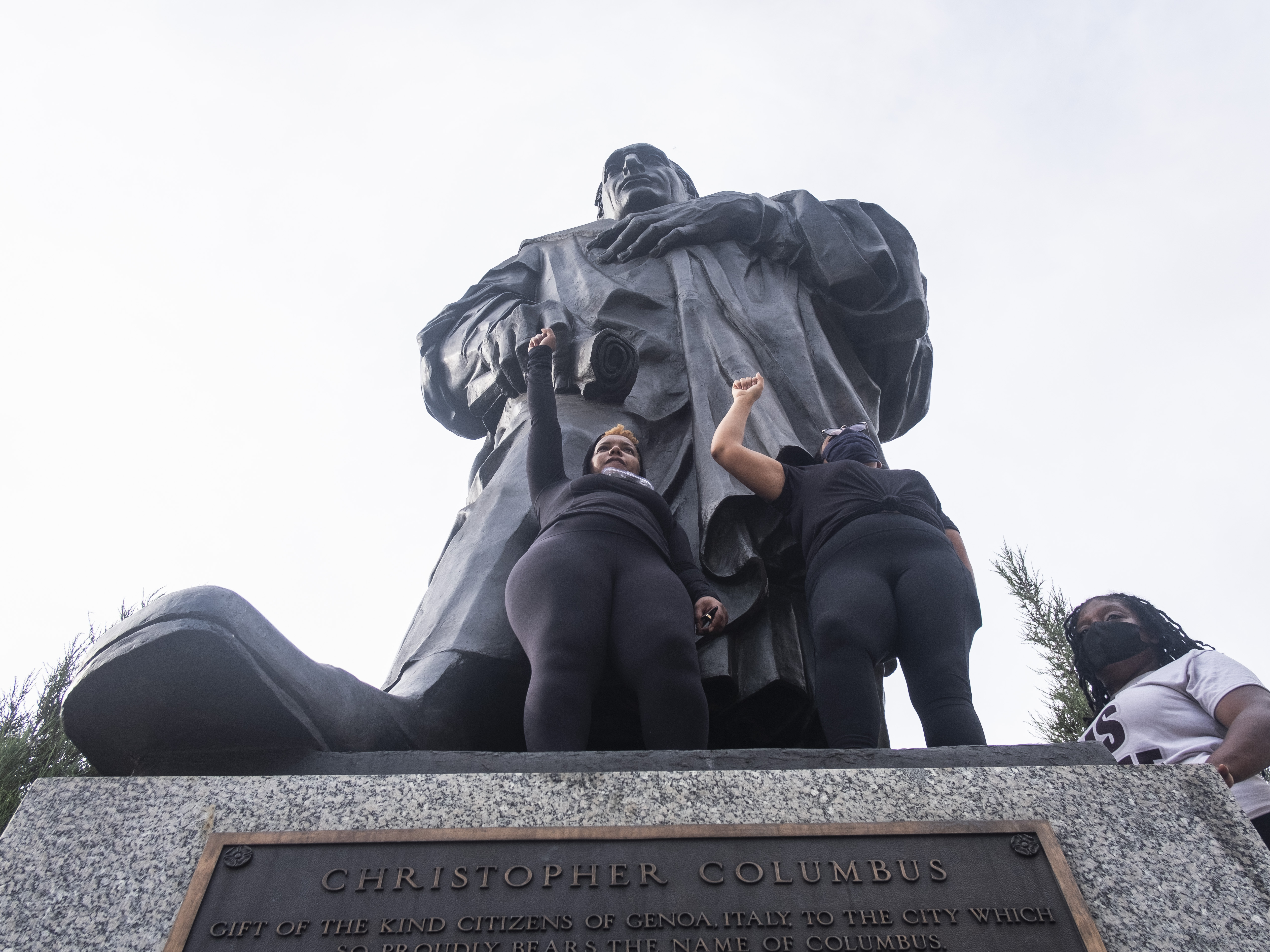Removed during protests, Louisville's statue of King Louis XVI is still in limbo 3 Protesters hold their fists in the air at the base of the Christopher Columbus Statue at Columbus City Hall during a protest organized against police brutality and the Columbus statue on June 27, 2020.