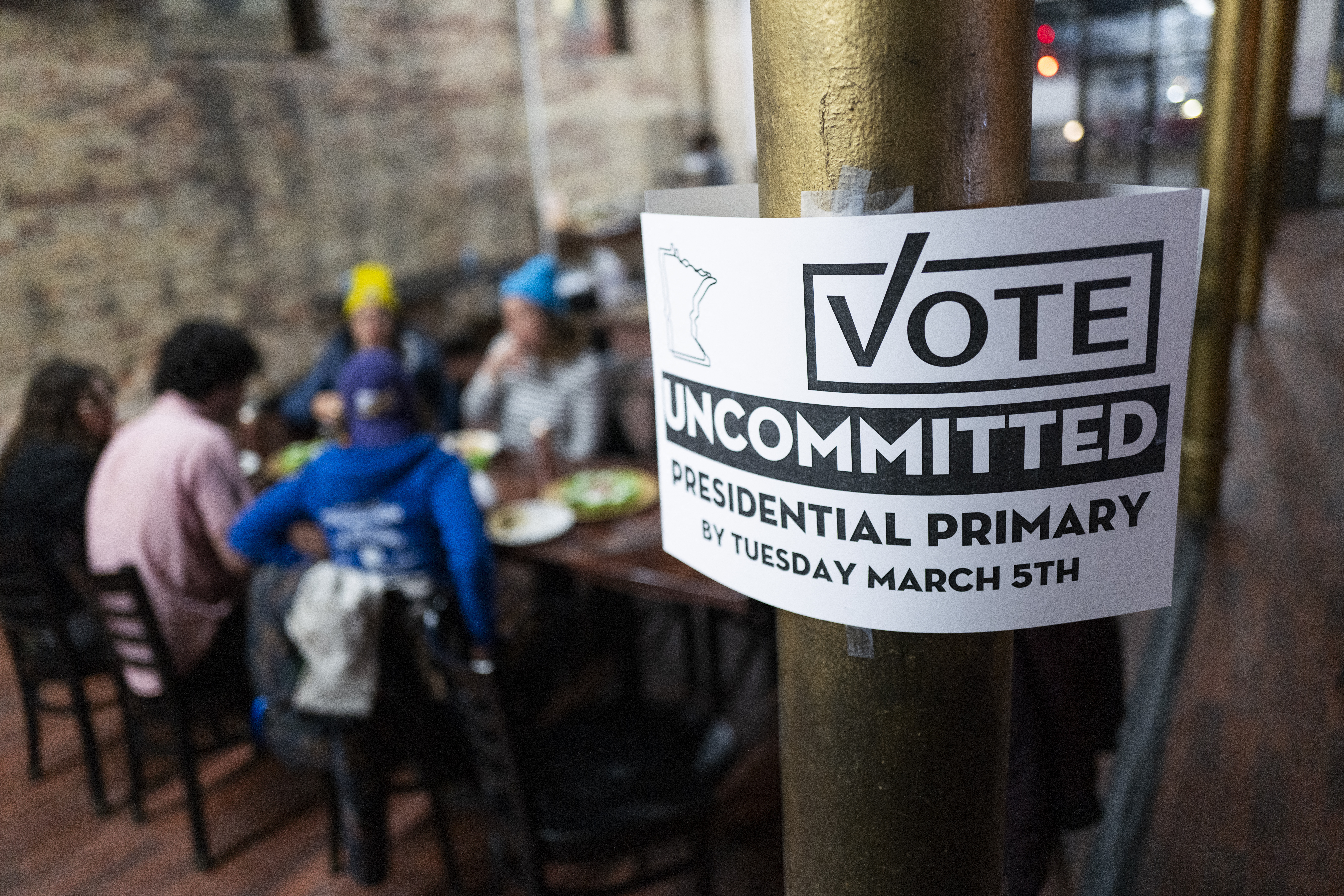 People gather at an Uncommitted Minnesota watch party during the presidential primary in Minneapolis.