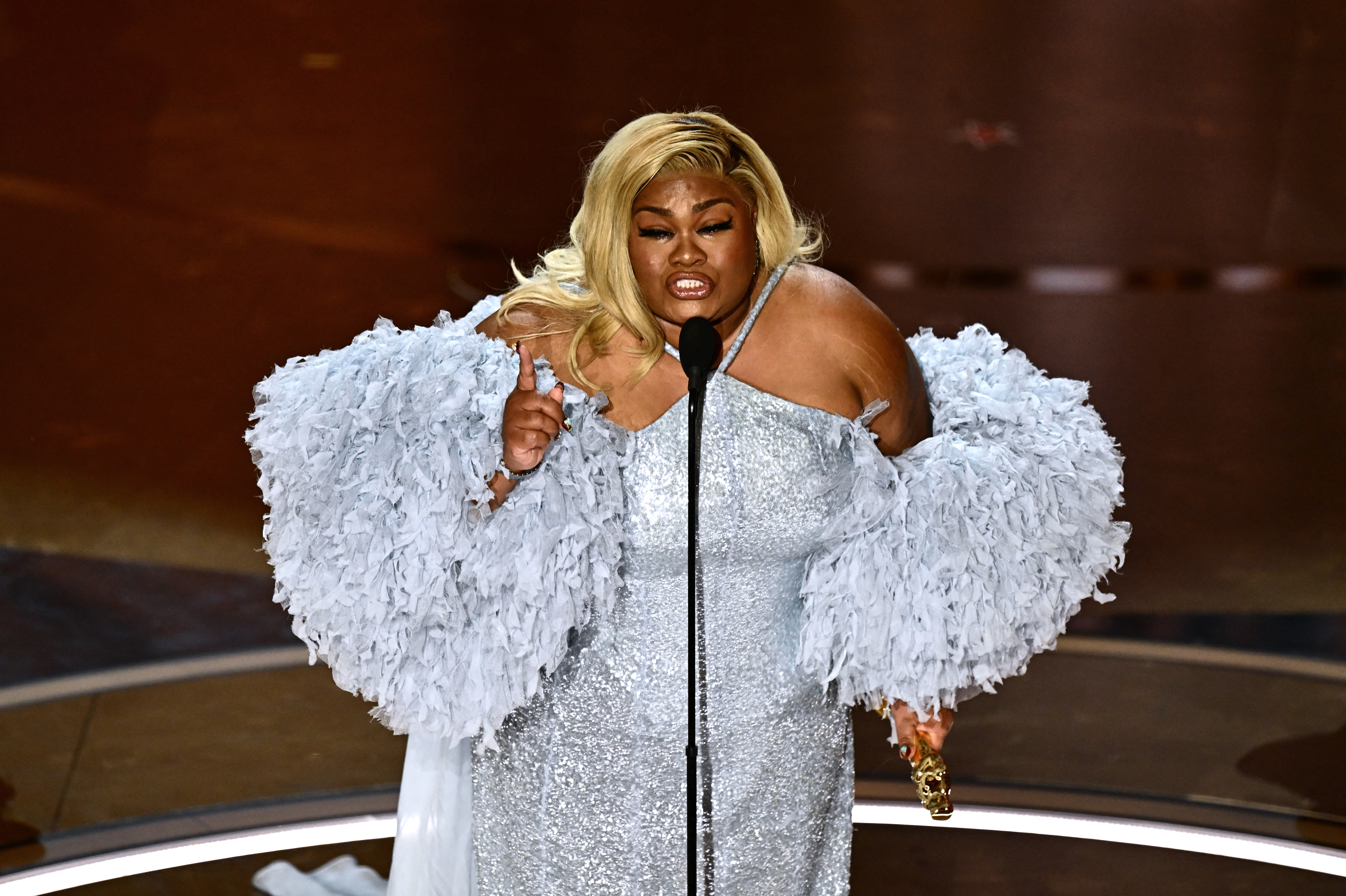 Da'Vine Joy Randolph accepts the award for best actress in a supporting role for her performance in <em>The Holdovers.</em> (AFP via Getty Images)