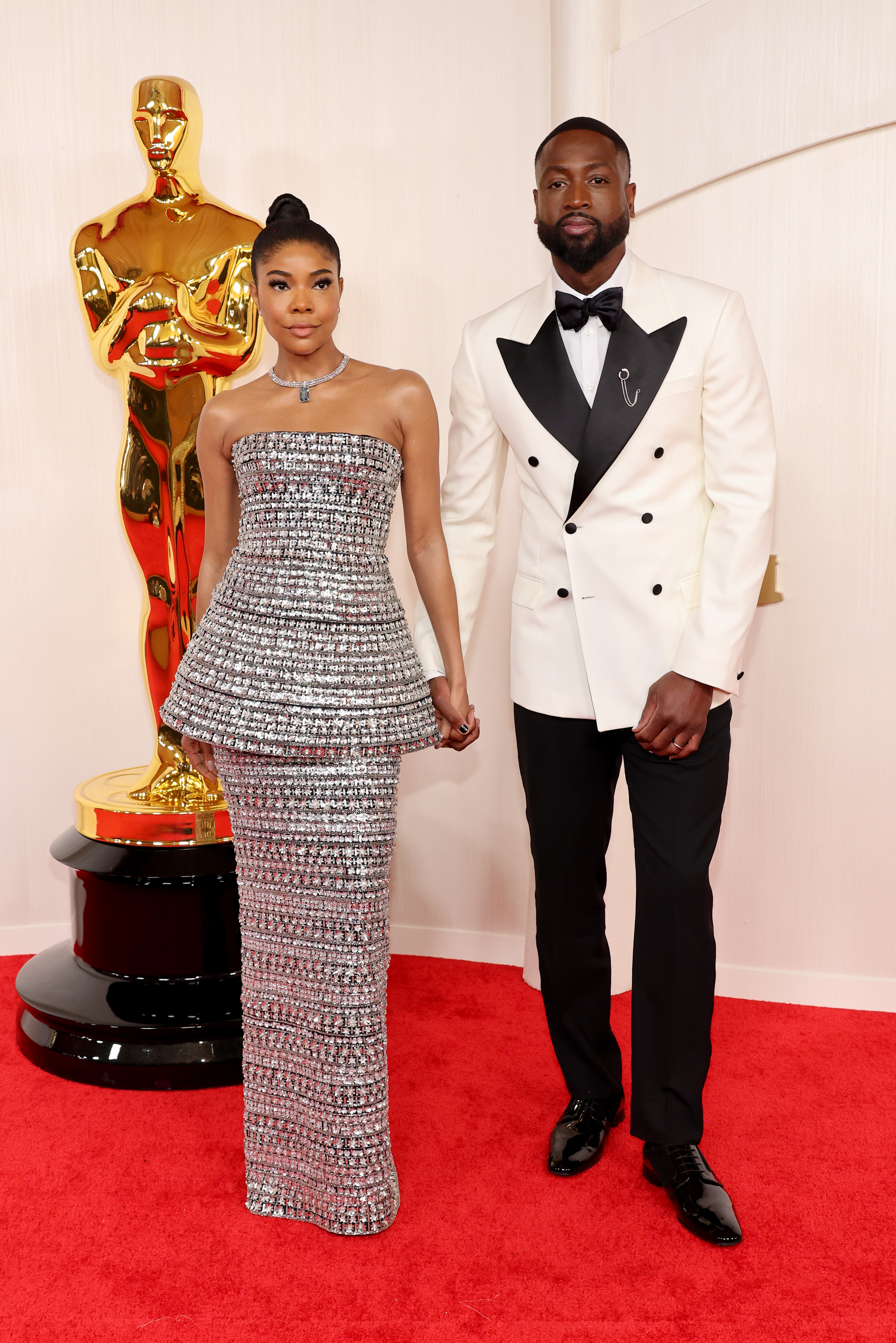 Red carpet looks from the 2024 Oscars 22 Gabrielle Union-Wade and Dwyane Wade