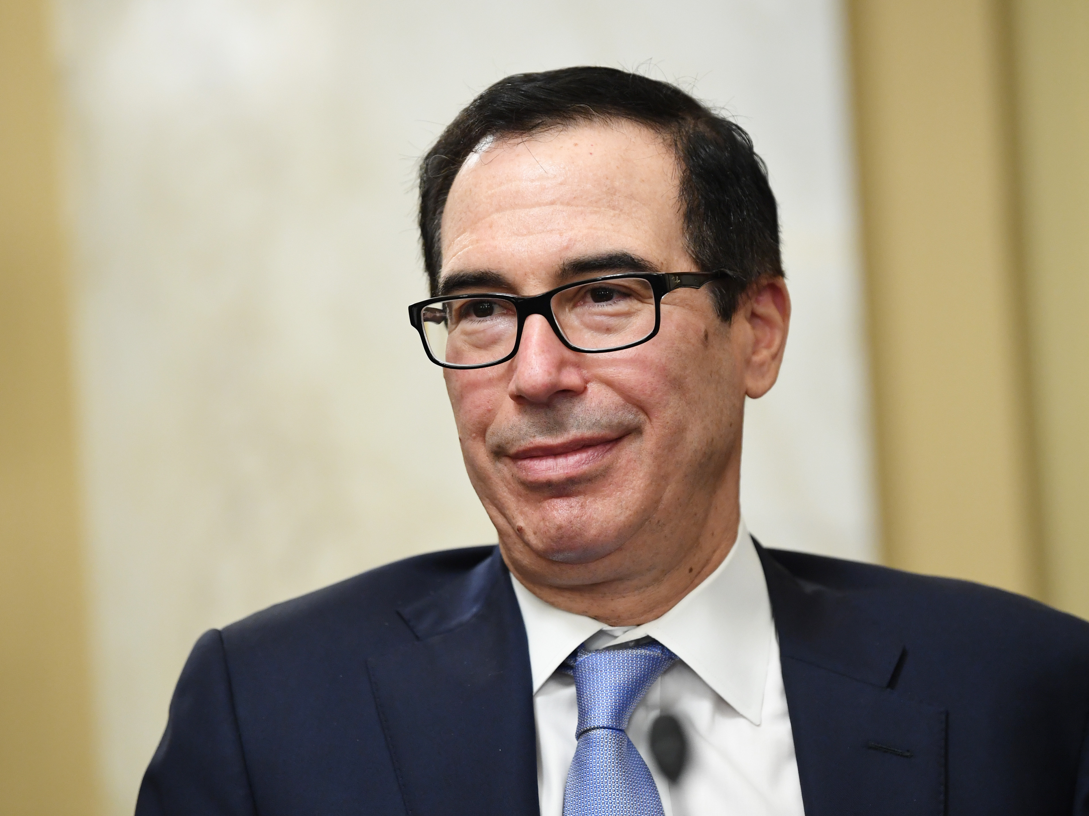 Former Treasury Secretary Steven Mnuchin said he's putting together a group of investors to try to buy TikTok. (POOL/AFP via Getty Images)