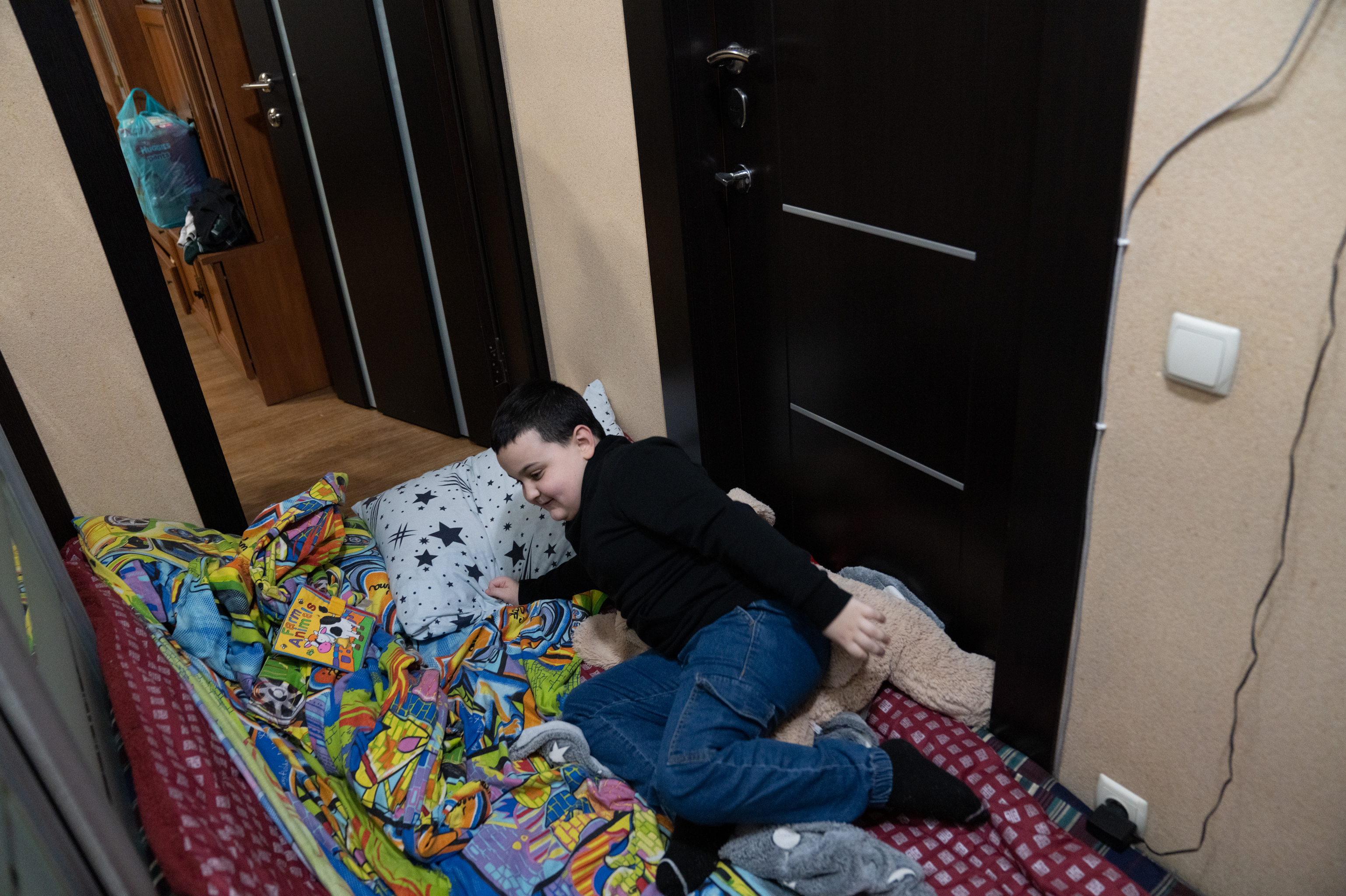 Ukraine's Kharkiv moves classrooms underground so kids survive Russian attacks 11 Maksym lies on a mattress in the hallway of his home while an air raid siren sounds in Kharkiv. It's the only part of the apartment without any windows and he feels safer during the frequent Russian missile attacks.