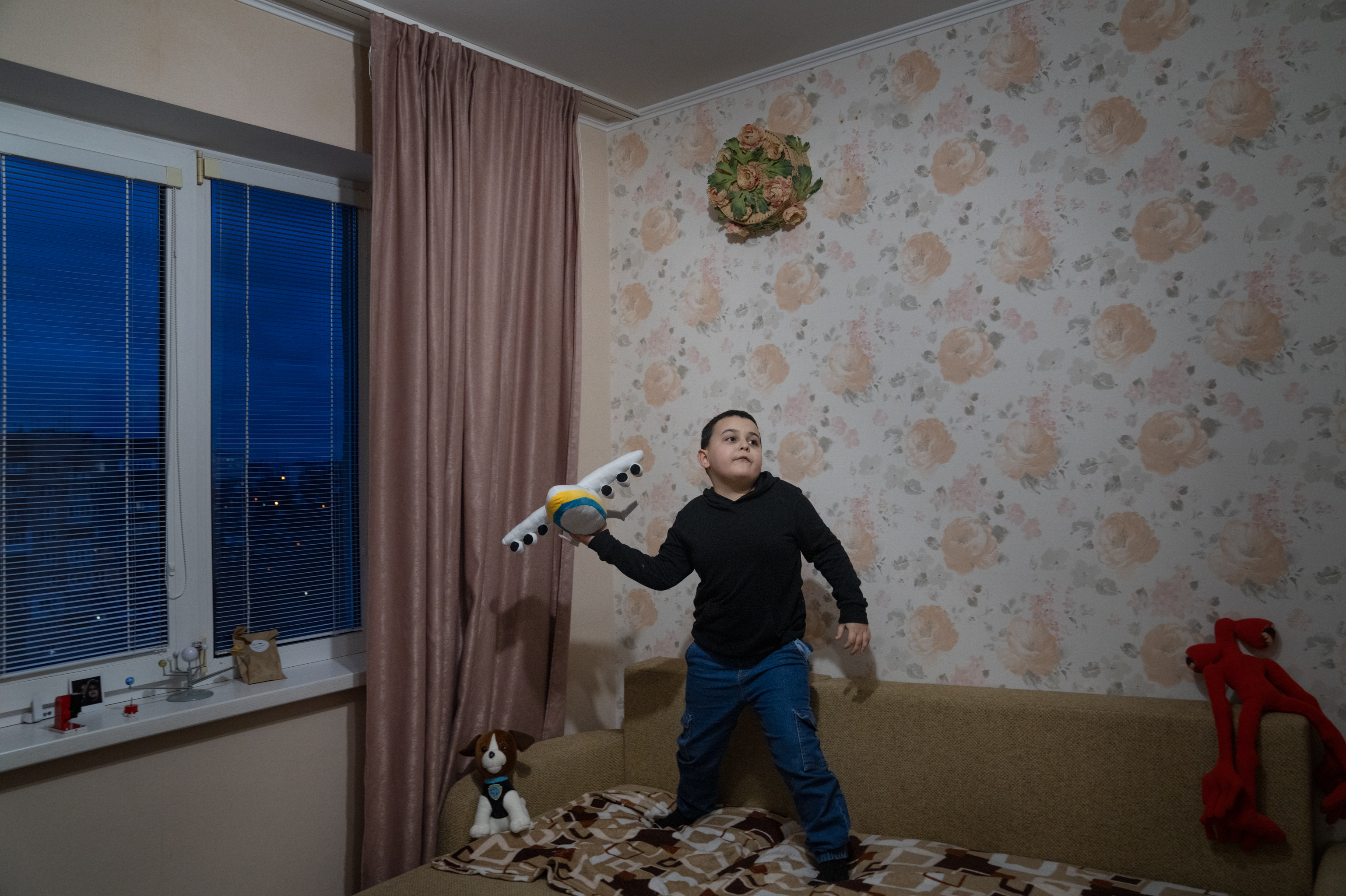 Ukraine's Kharkiv moves classrooms underground so kids survive Russian attacks 2 Maksym Timchenko, 7, plays with a plane in the living room of his family's apartment in Kharkiv, Ukraine. Maksym, who is in second grade, goes to in-person school twice a week in classrooms built inside a subway station where entire families sheltered in the early days of the war.