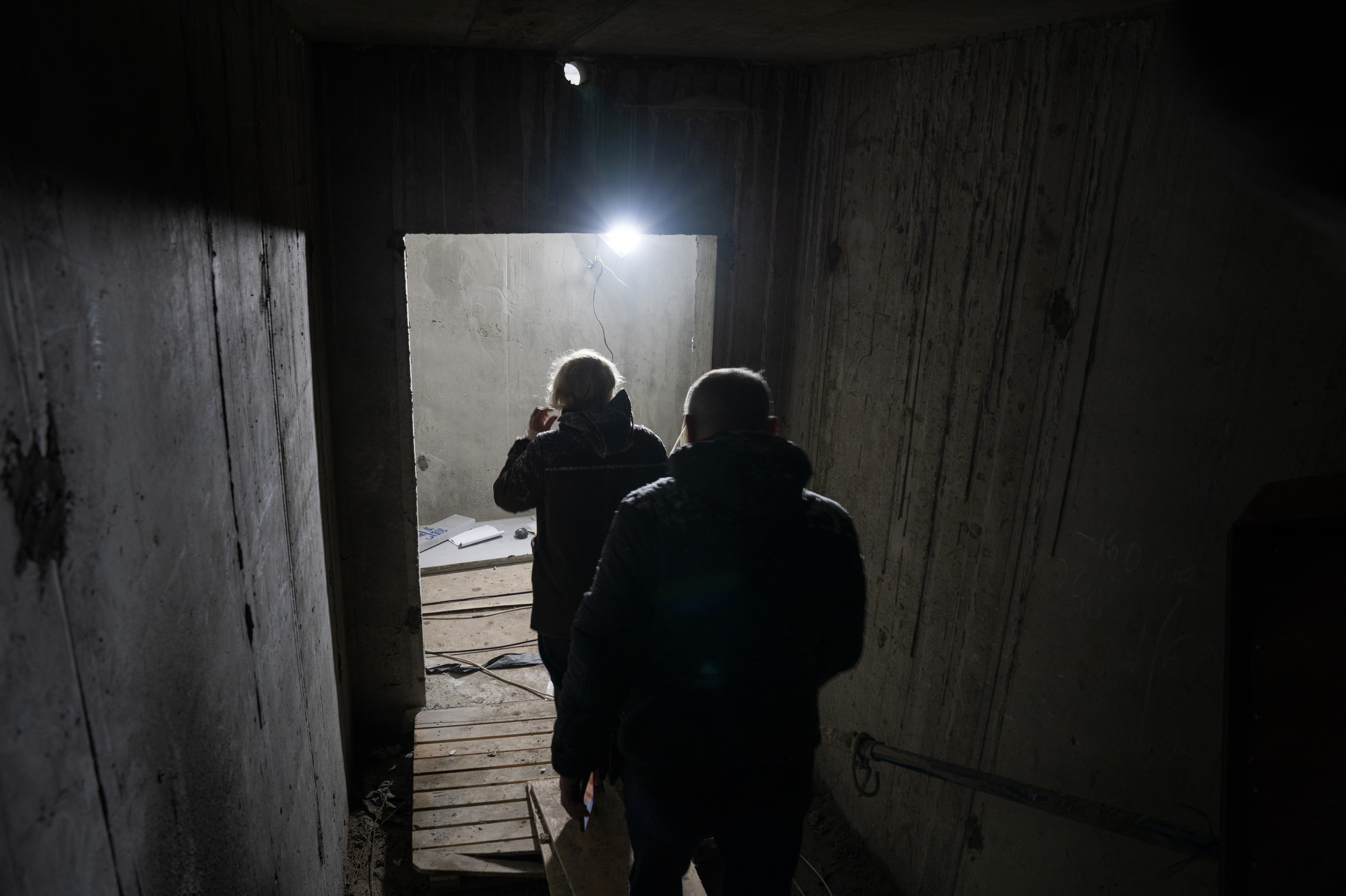Ukraine's Kharkiv moves classrooms underground so kids survive Russian attacks 5 People walk down the stairs to the underground school being built in Kharkiv.