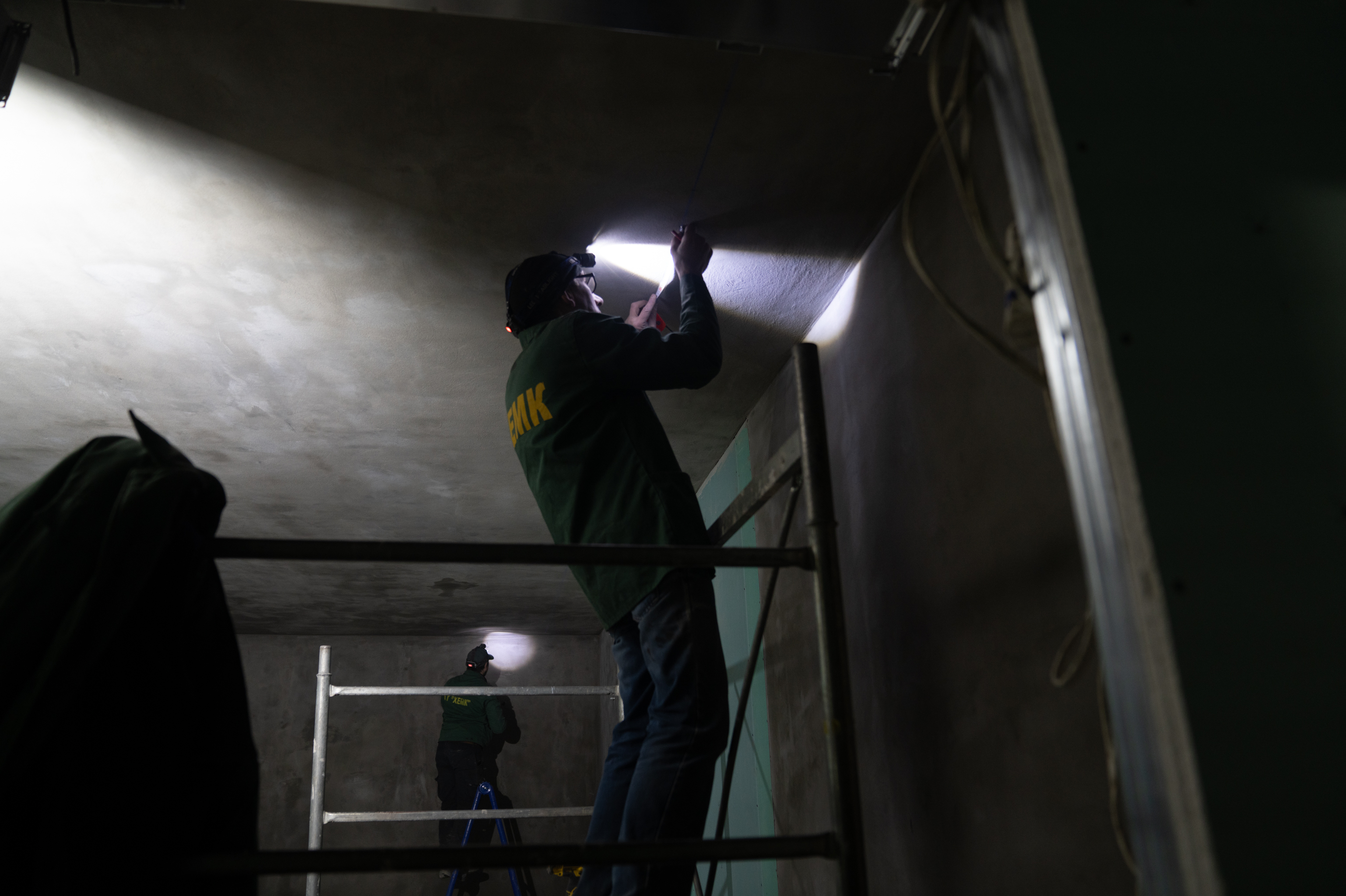 Ukraine's Kharkiv moves classrooms underground so kids survive Russian attacks 7 Workers install electrical wires for an underground school that is being built in Kharkiv.