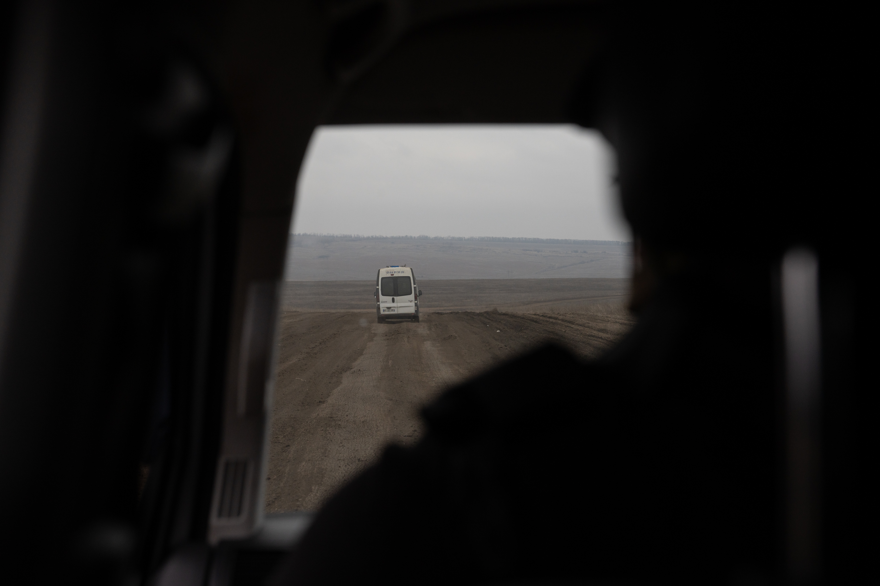 A mayor in Ukraine aids his town's few remaining people, as Russia closes in 3 Mayor Chaus and his deputy fill a van with bread and bottled water for residents in Chasiv Yar as air raid sirens blare.