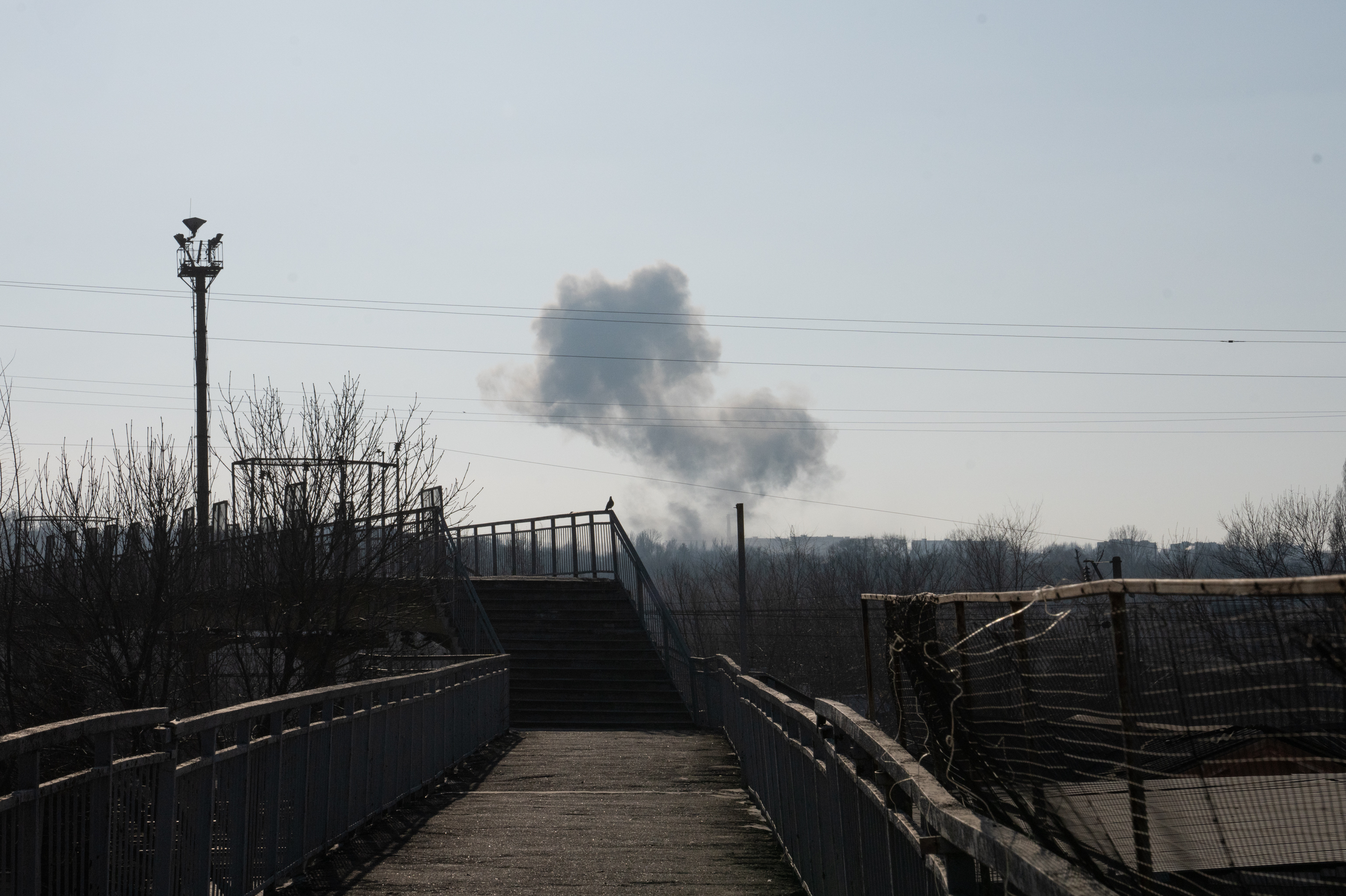 A mayor in Ukraine aids his town's few remaining people, as Russia closes in 6 A plume of smoke from an airstrike near Kostiantynivka can be seen from a distance.
