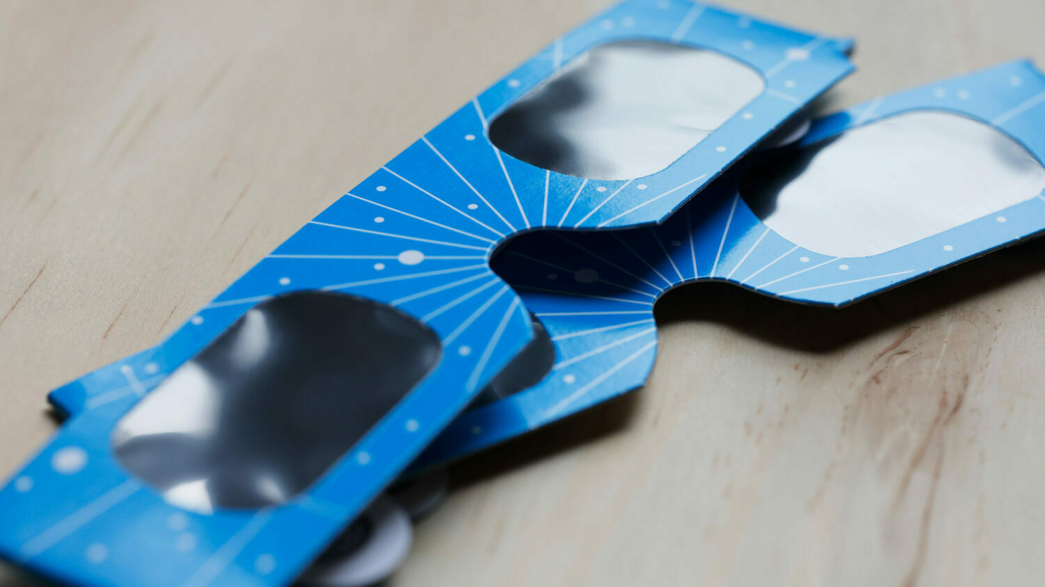 In this photo illustration, eclipse glasses from Warby Parker are seen on a table in New York City. (Getty Images)