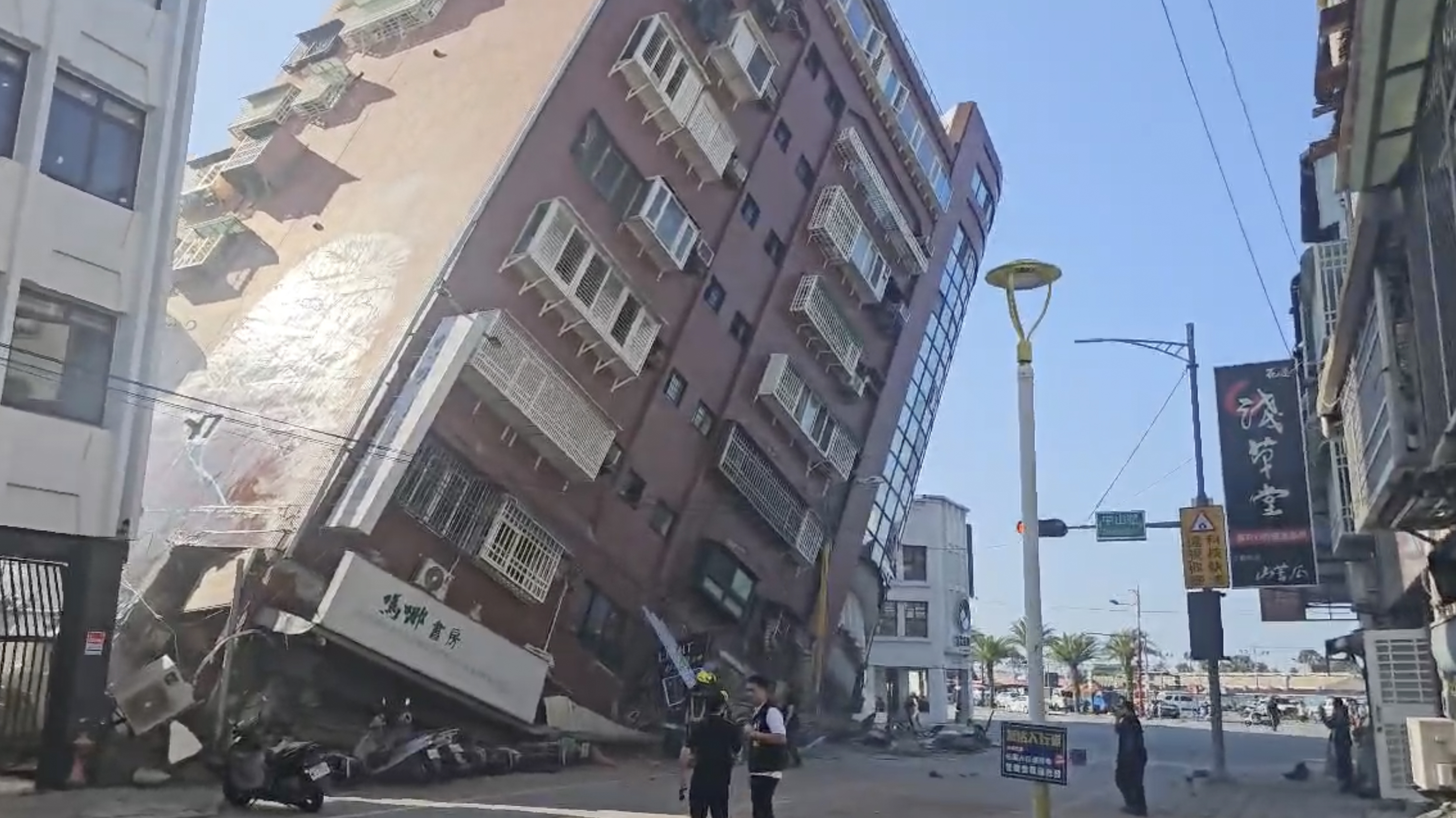 In this image taken from a video footage run by TVBS, a partially collapsed building is seen in Hualien, eastern Taiwan on Wednesday, April 3, 2024.