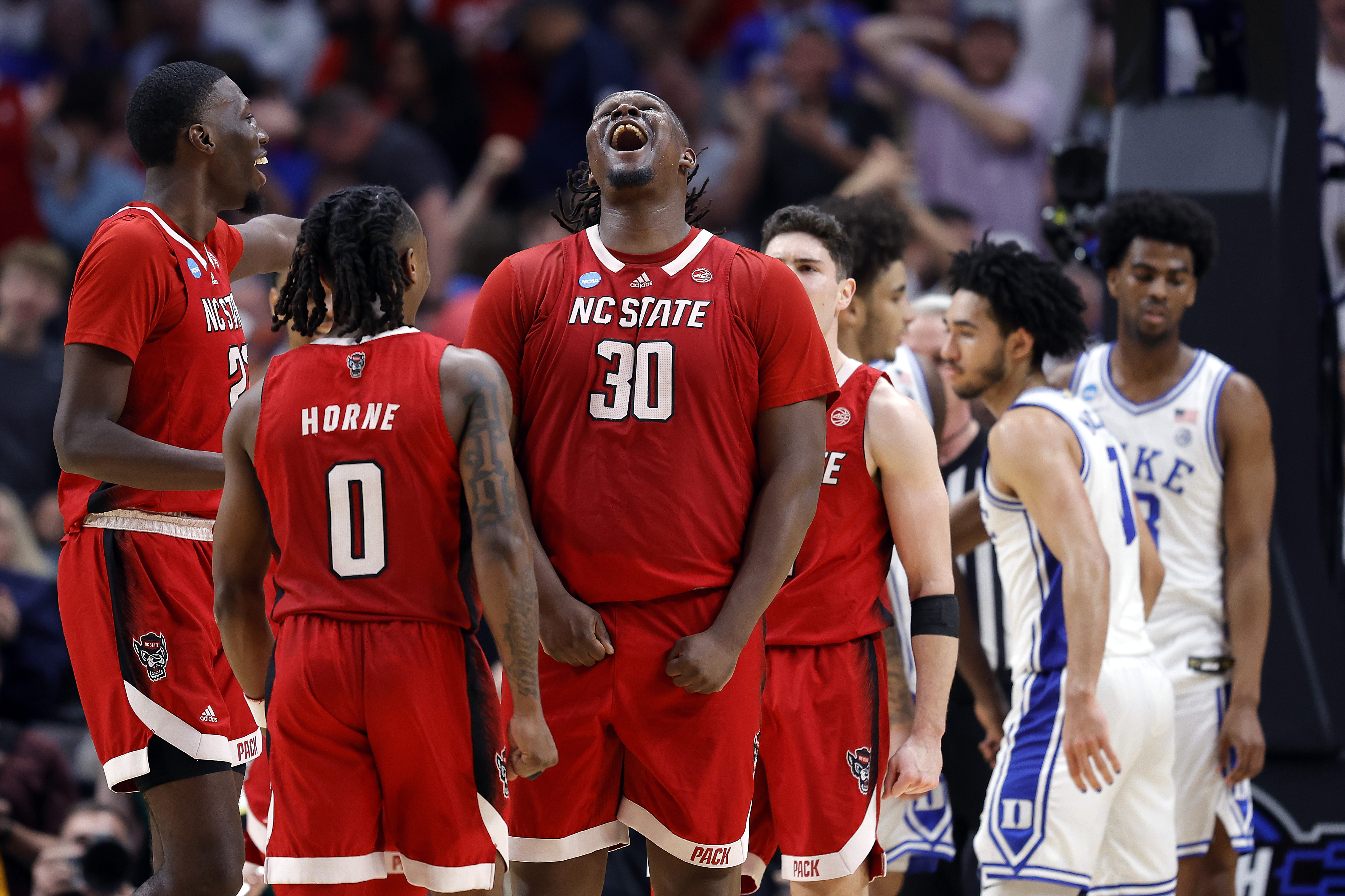 DJ Burns and N.C. State head to the Final 4, smiles, skips and all : NPR