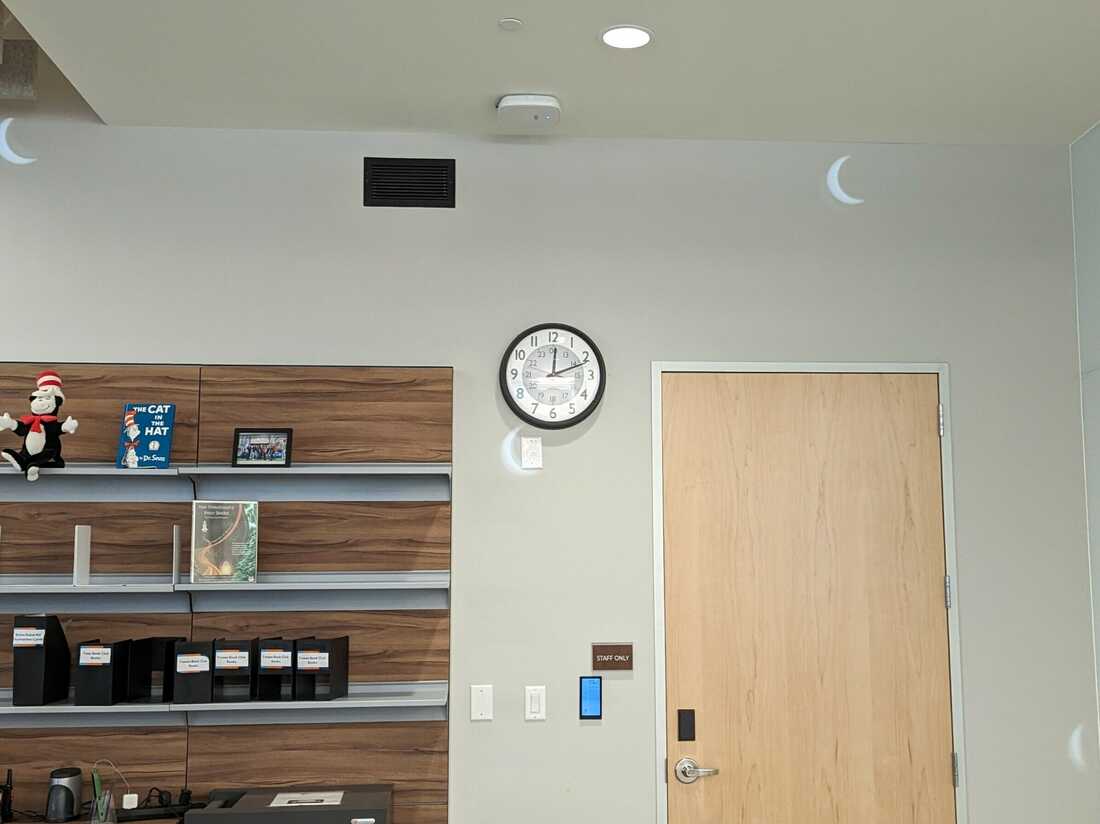 rrpl 41 cm disco ball images on wall behind 2nd floor reference desk 2 disco ball is 20 m away outside in rooftop garden e9dbea82b07a2ffc8f5b432df106a08253eb7419 s1100 c50