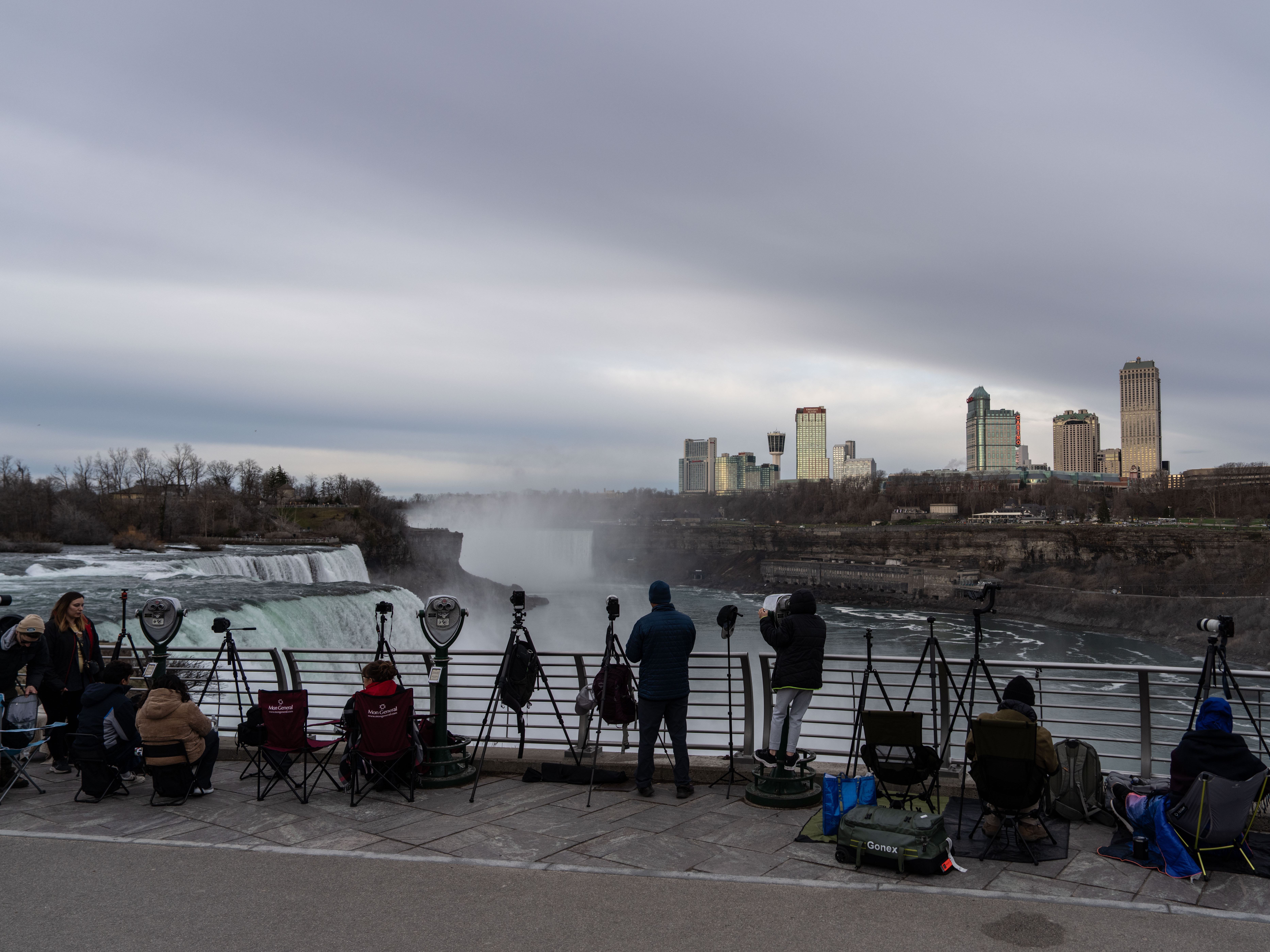 Americans await the eclipse, with glasses secured and fingers crossed for clear skies Americans await the eclipse, with glasses secured and fingers crossed for clear skies