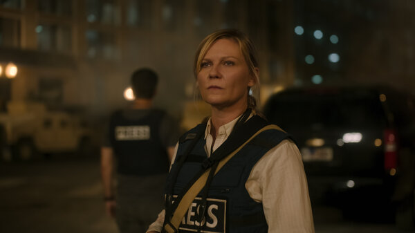 Kirsten Dunst as Lee in Civil War.