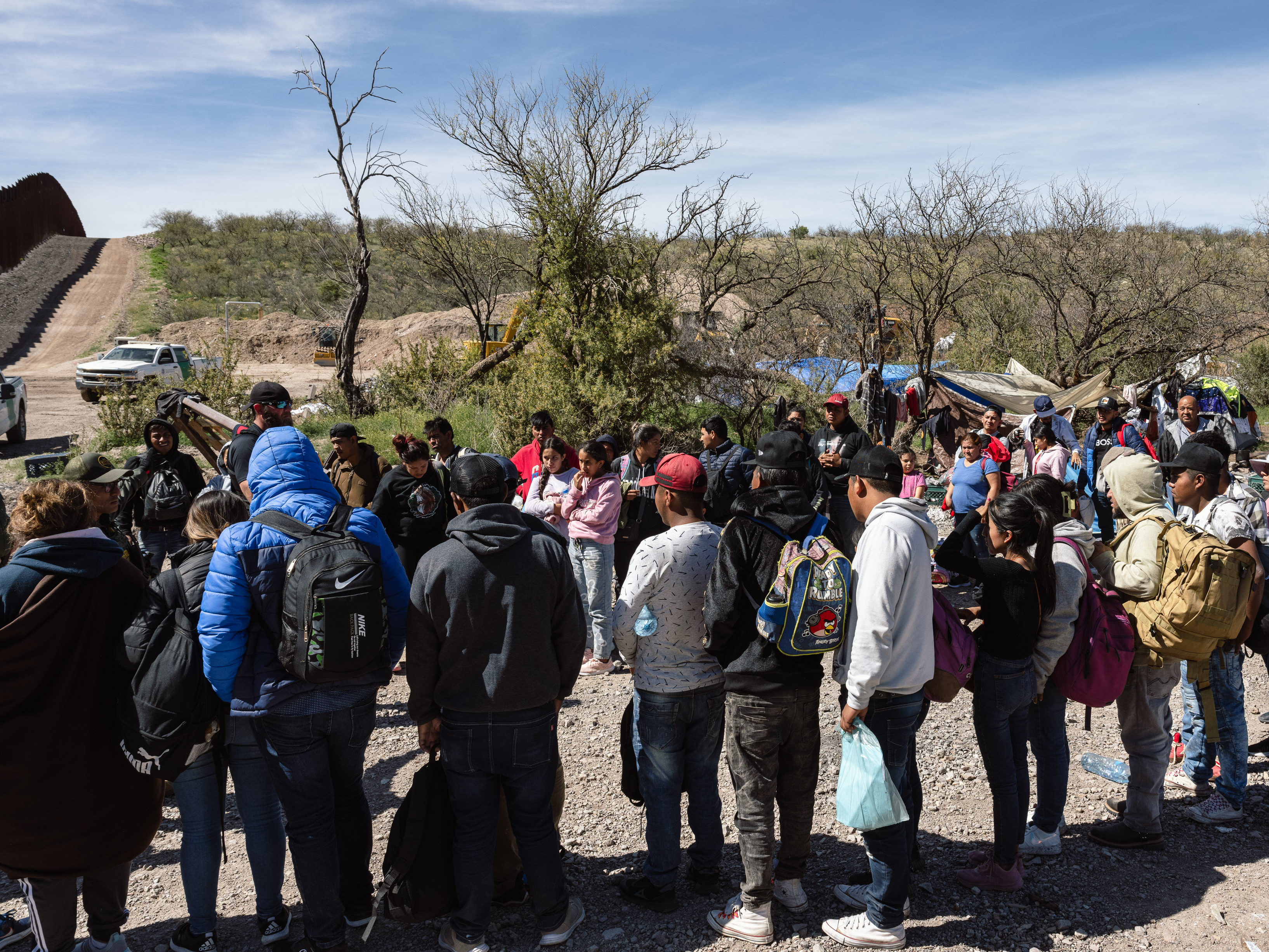 Border Patrol picks up a group of people seeking asylum from an aid camp near Sasabe, Arizona, on Wednesday, March 13, 2024. (Bloomberg via Getty Images)