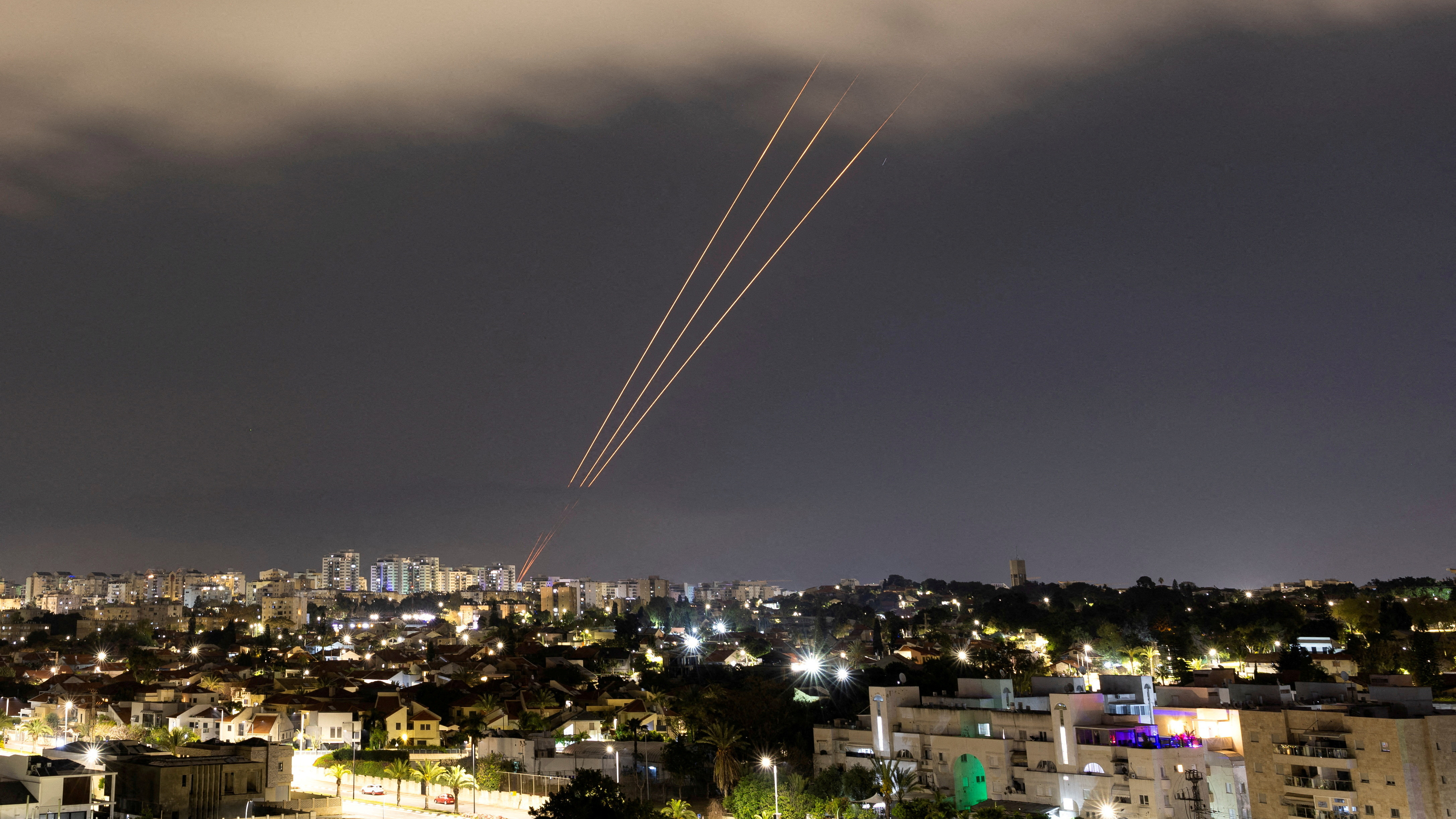 An anti-missile system operates after Iran launched drones and missiles toward Israel, as seen from Ashkelon, Israel, April 14.
