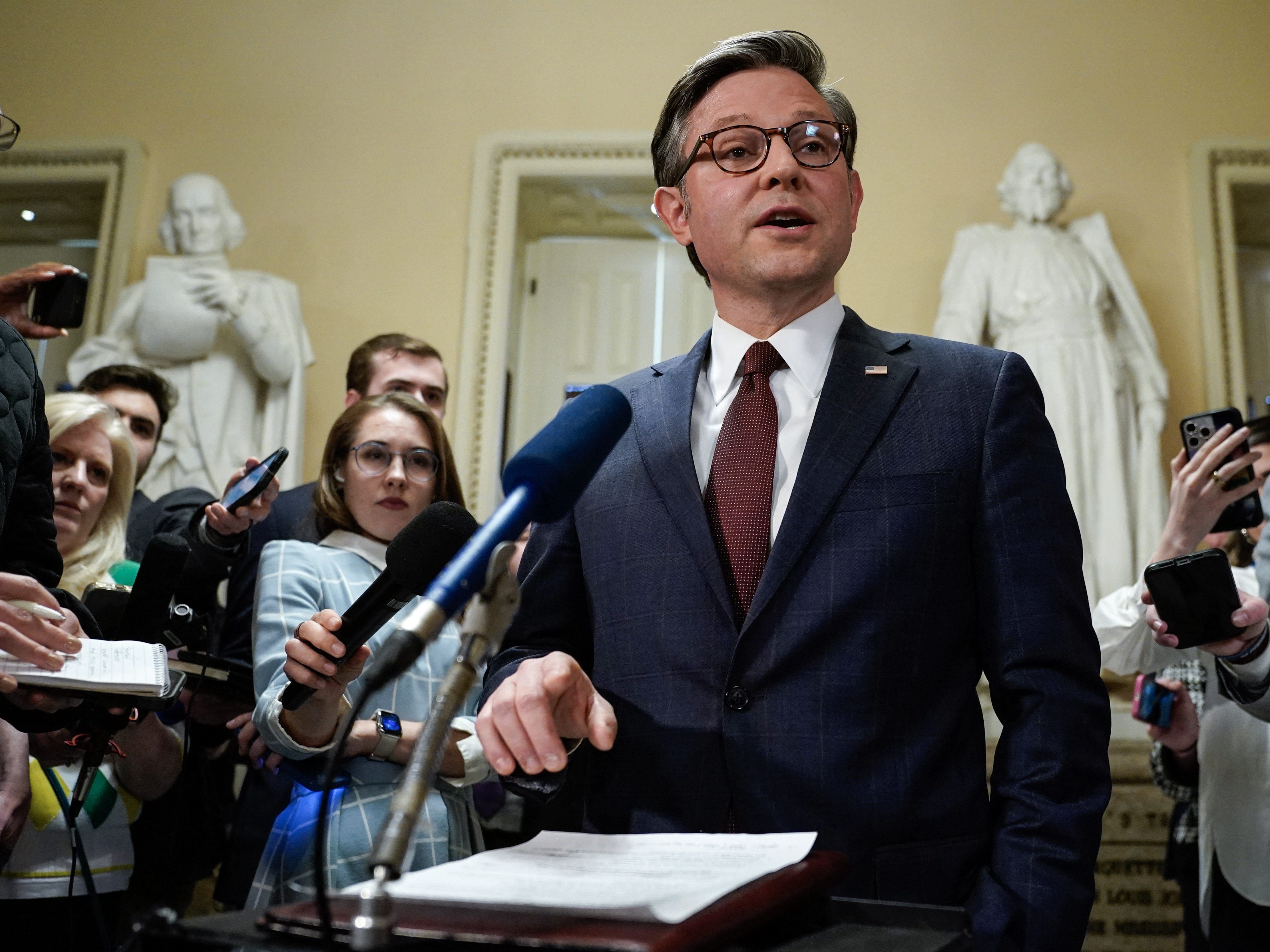 Speaker of the House Mike Johnson speaks to the press after the chamber passed a major aid package for Ukraine, Israel, and Taiwan on April 20. (AFP via Getty Images)