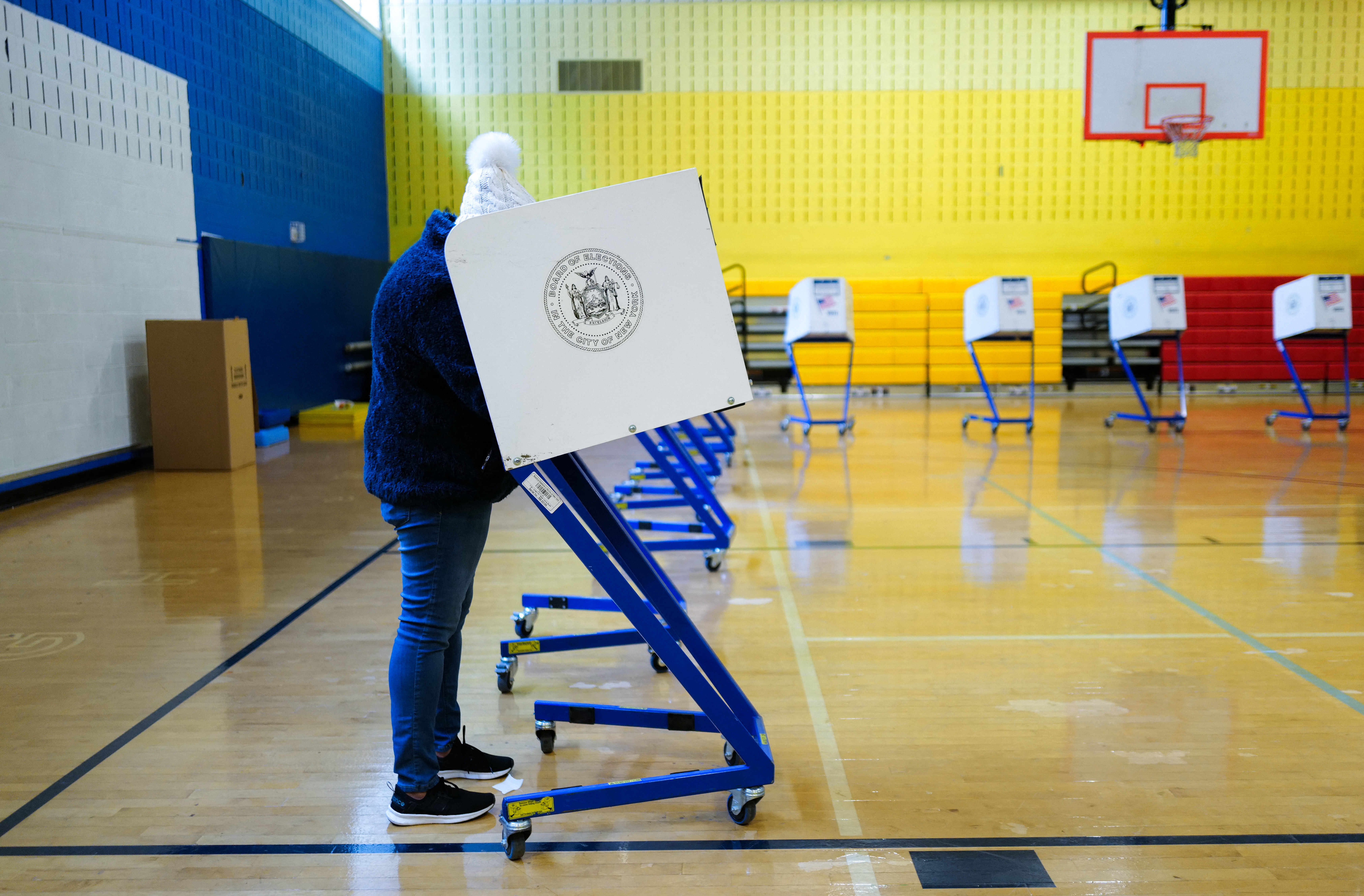 A person votes at a polling station in Manhattan during New York's presidential primary on April 2. (AFP via Getty Images)