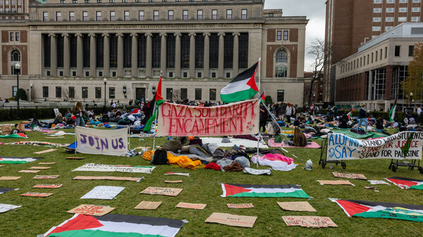 Students occupy the campus of Columbia University on Friday, calling for the school to divest from companies with ties to Israel.