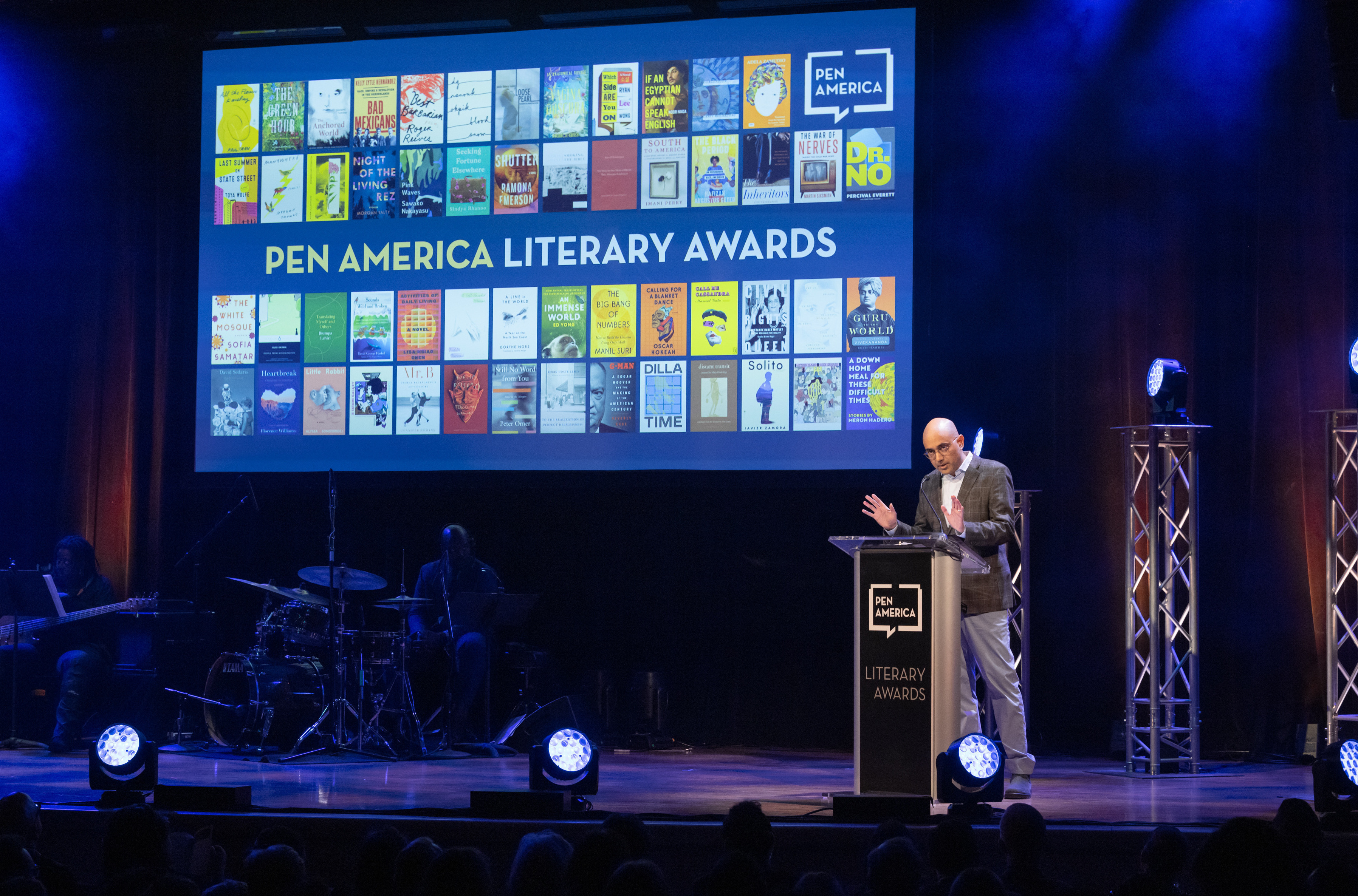 Playwright Ayad Akhtar on stage at the 2023 PEN America Literary Awards in his role as then-president of the organization. (PEN America)