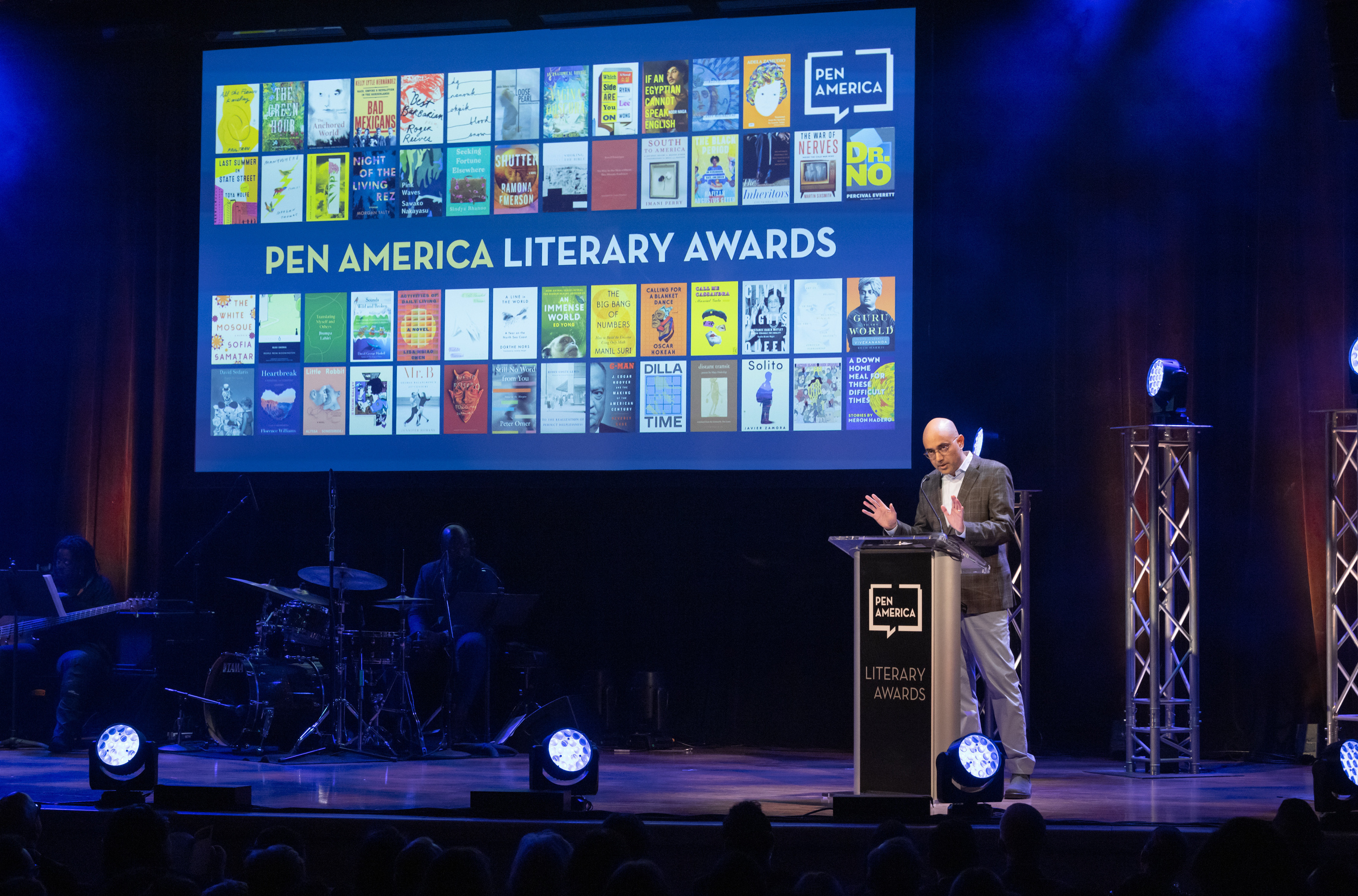 Playwright Ayad Akhtar on stage at the 2023 PEN America Literary Awards in his role as then-president of the organization.