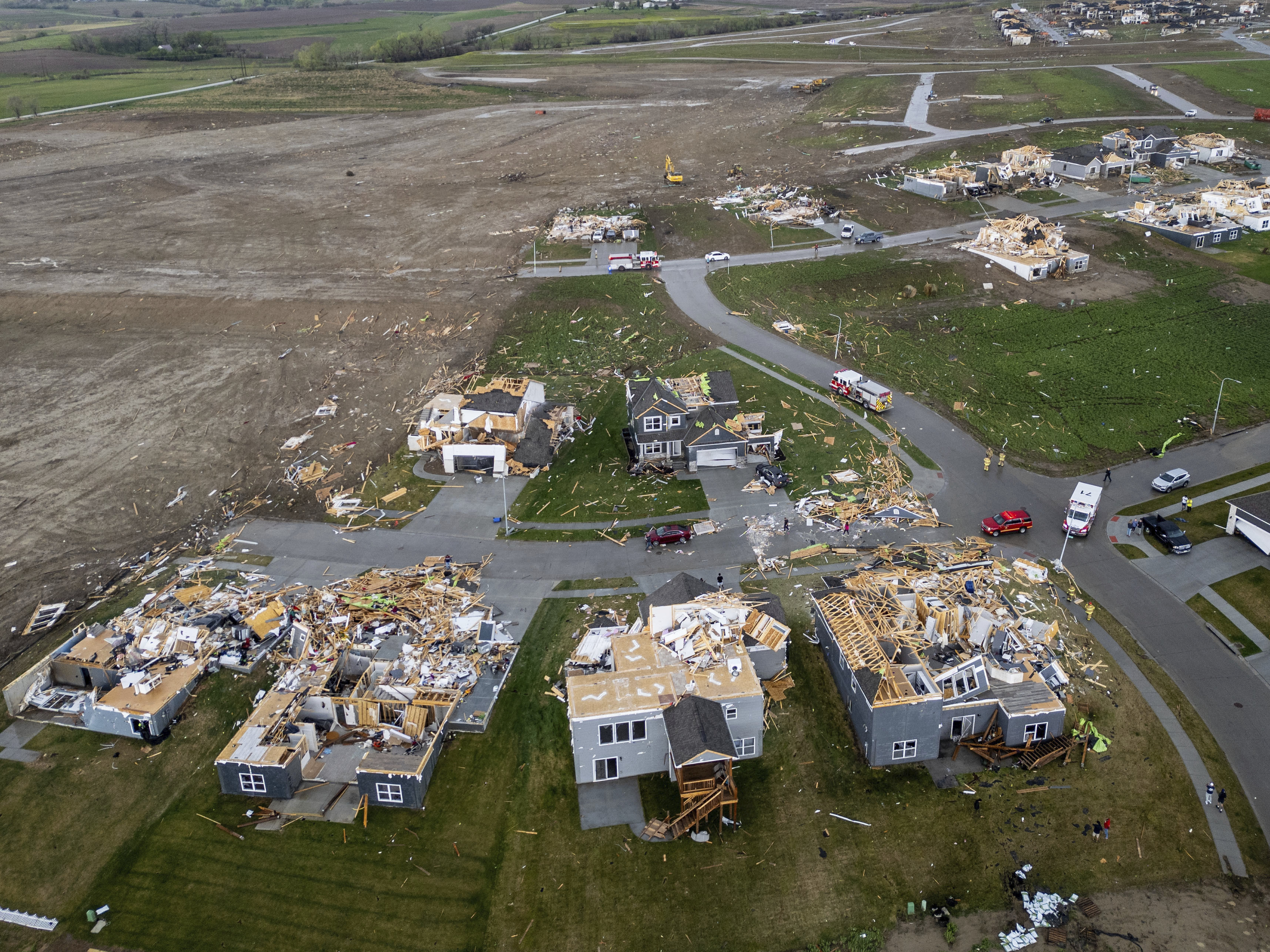 Tornadoes collapse buildings and level homes in Nebraska and Iowa