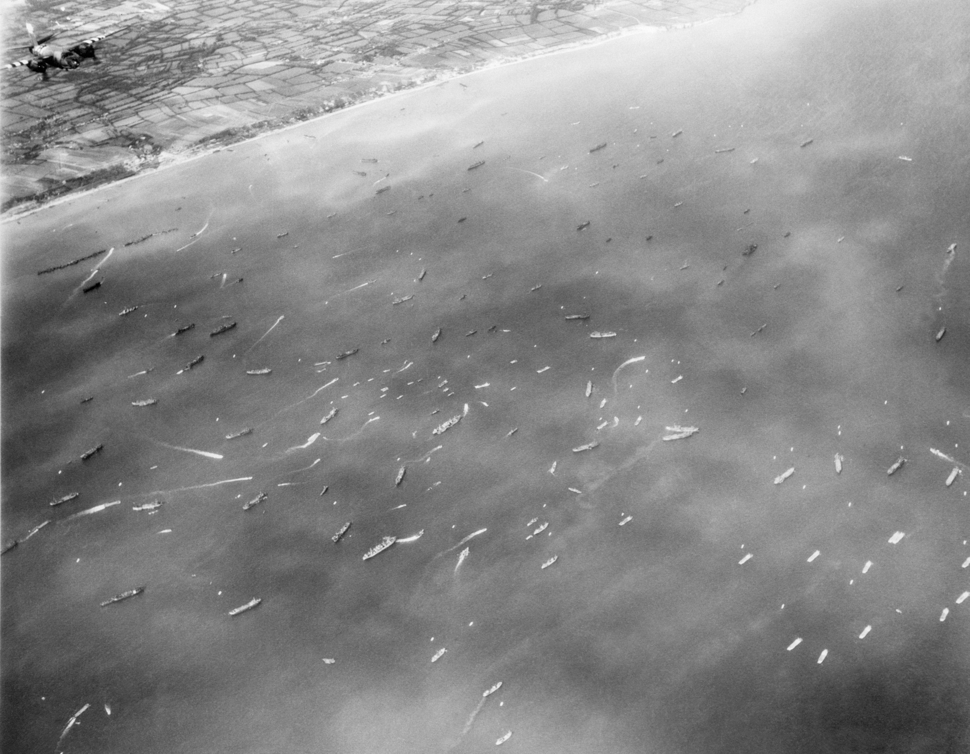The view from a B-26 bomber of the thousands of ships ferrying people and materiel across the English Channel to France.