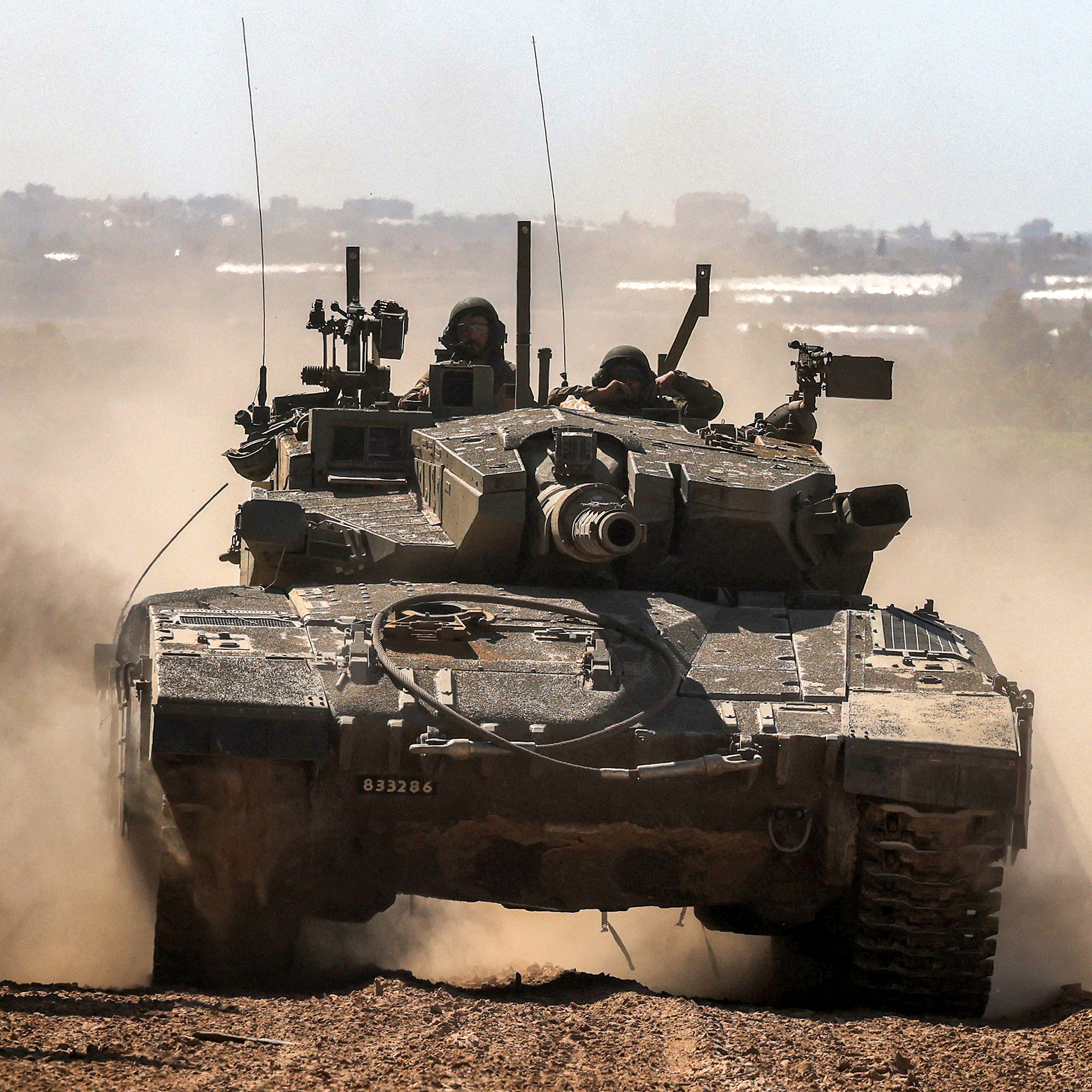 An Israeli army battle tank moves along the border with the Gaza Strip in southern Israel on May 7.